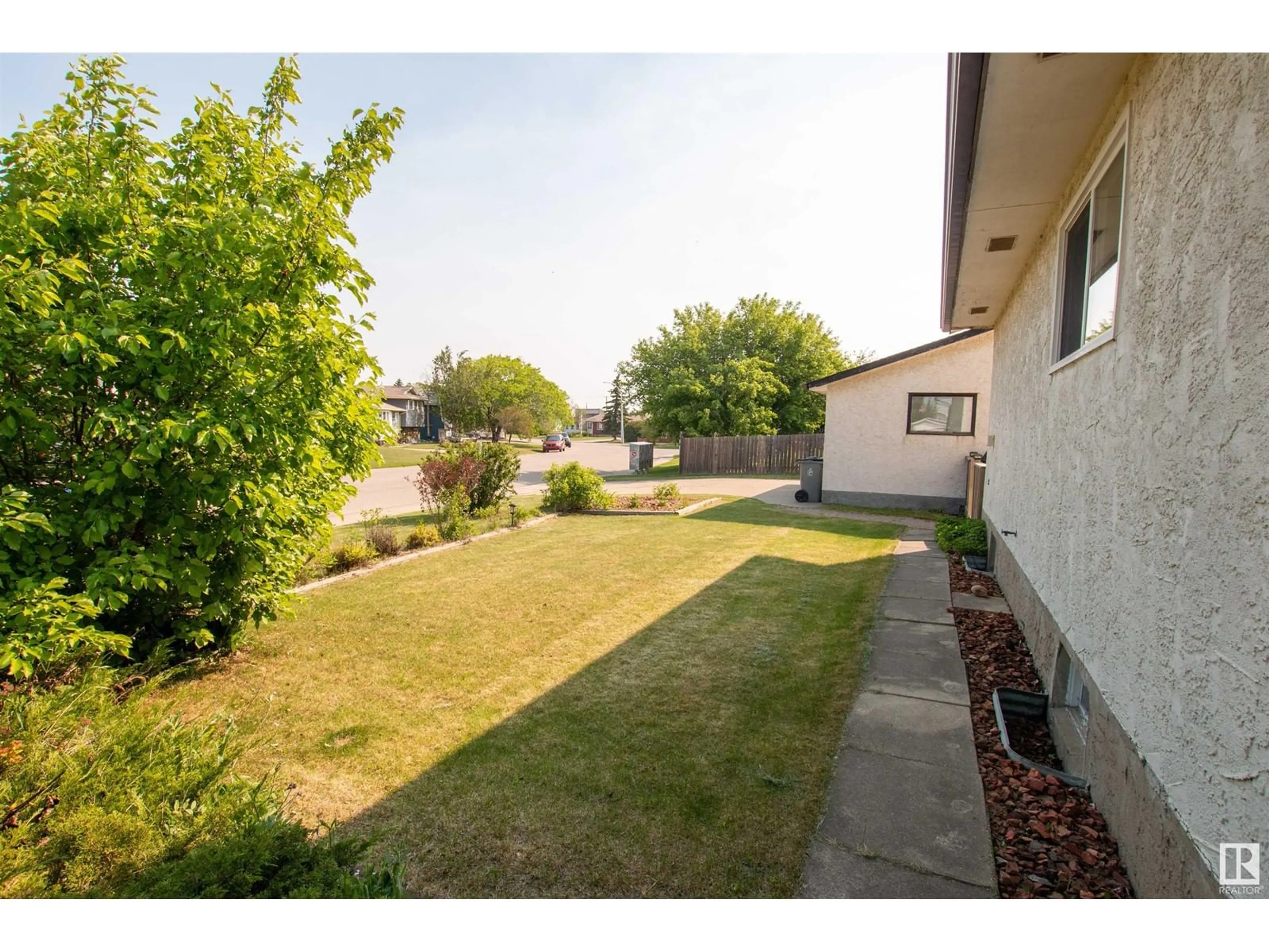 A pic from outside/outdoor area/front of a property/back of a property/a pic from drone, street for 10109 87 ST, Morinville Alberta T8R1B8