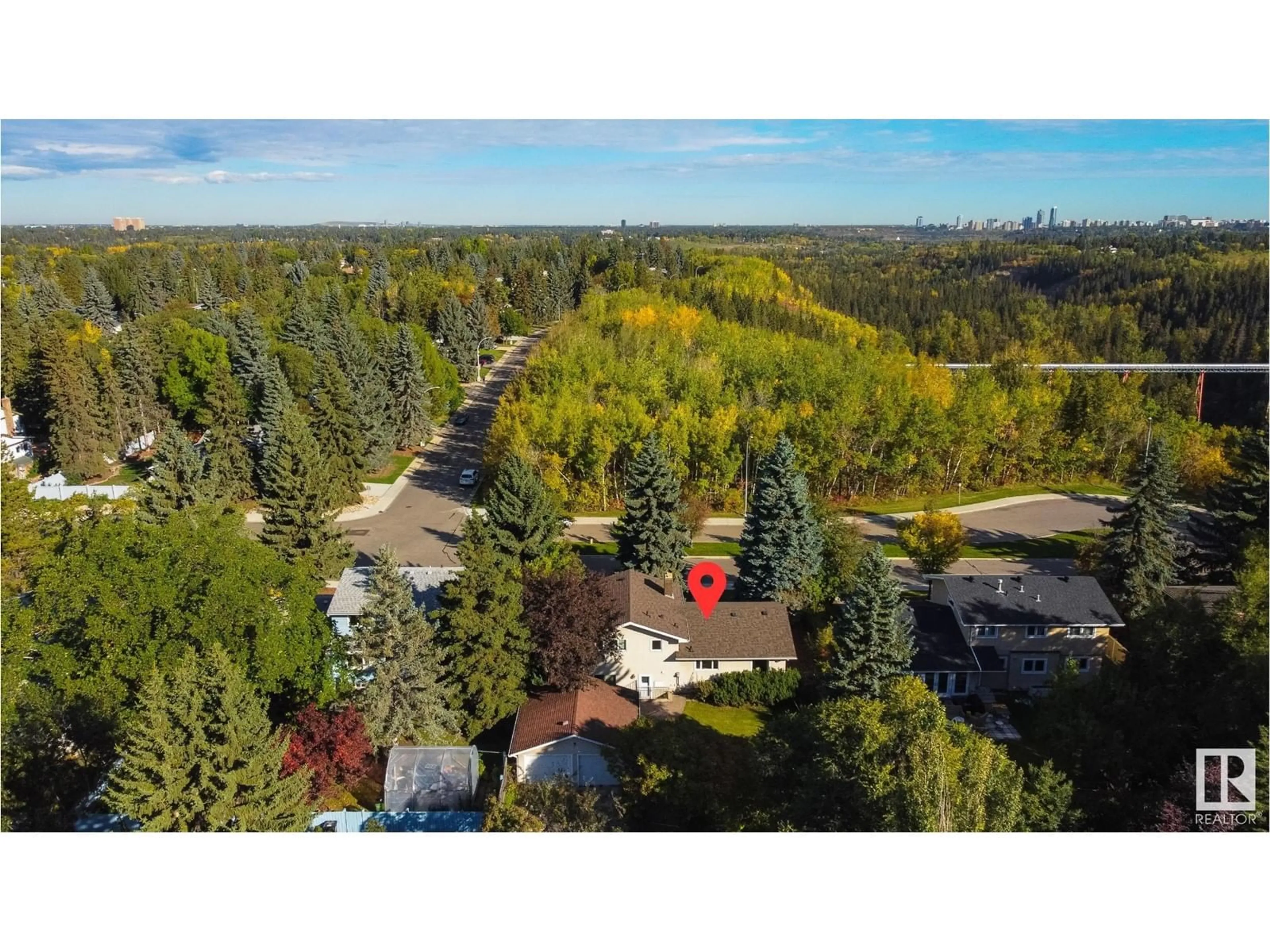 A pic from outside/outdoor area/front of a property/back of a property/a pic from drone, forest/trees view for NW - 14007 53 AV, Edmonton Alberta T6H0S9
