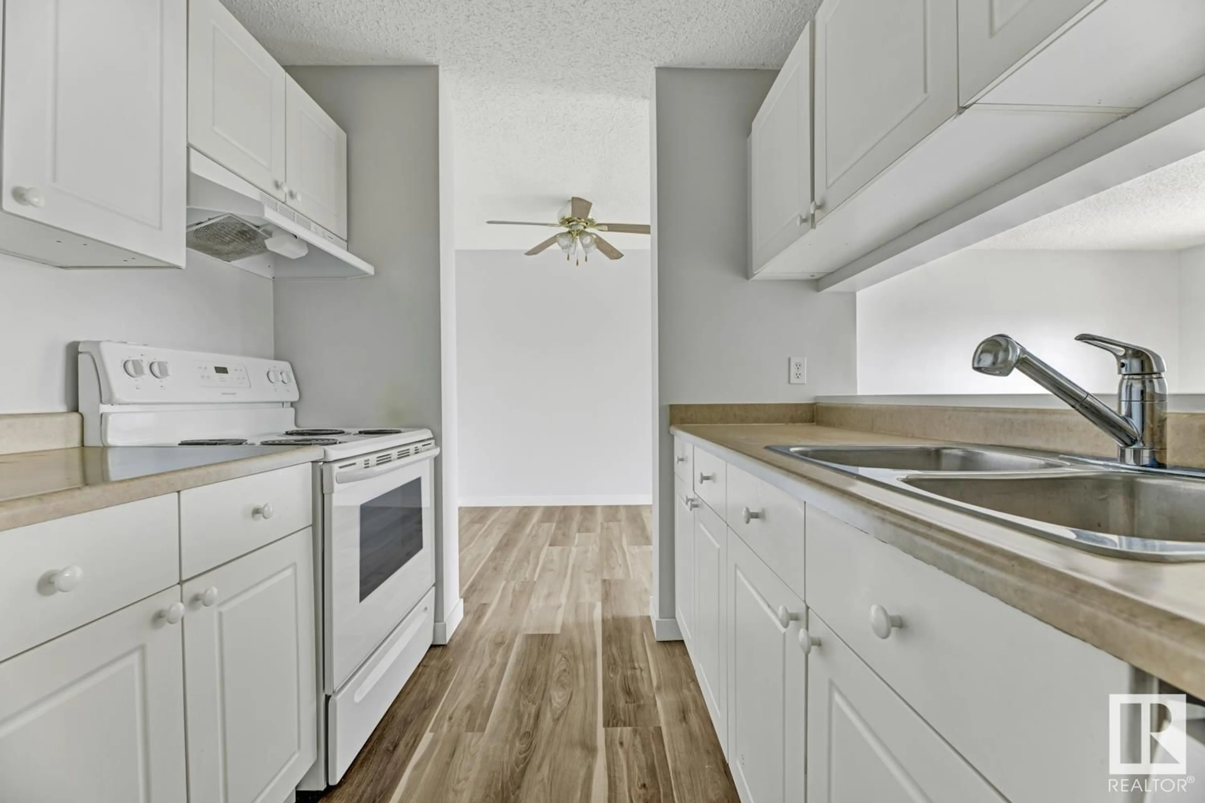 Standard kitchen, wood/laminate floor for 2520 - 439 50 ST NW, Edmonton Alberta T6L7A8