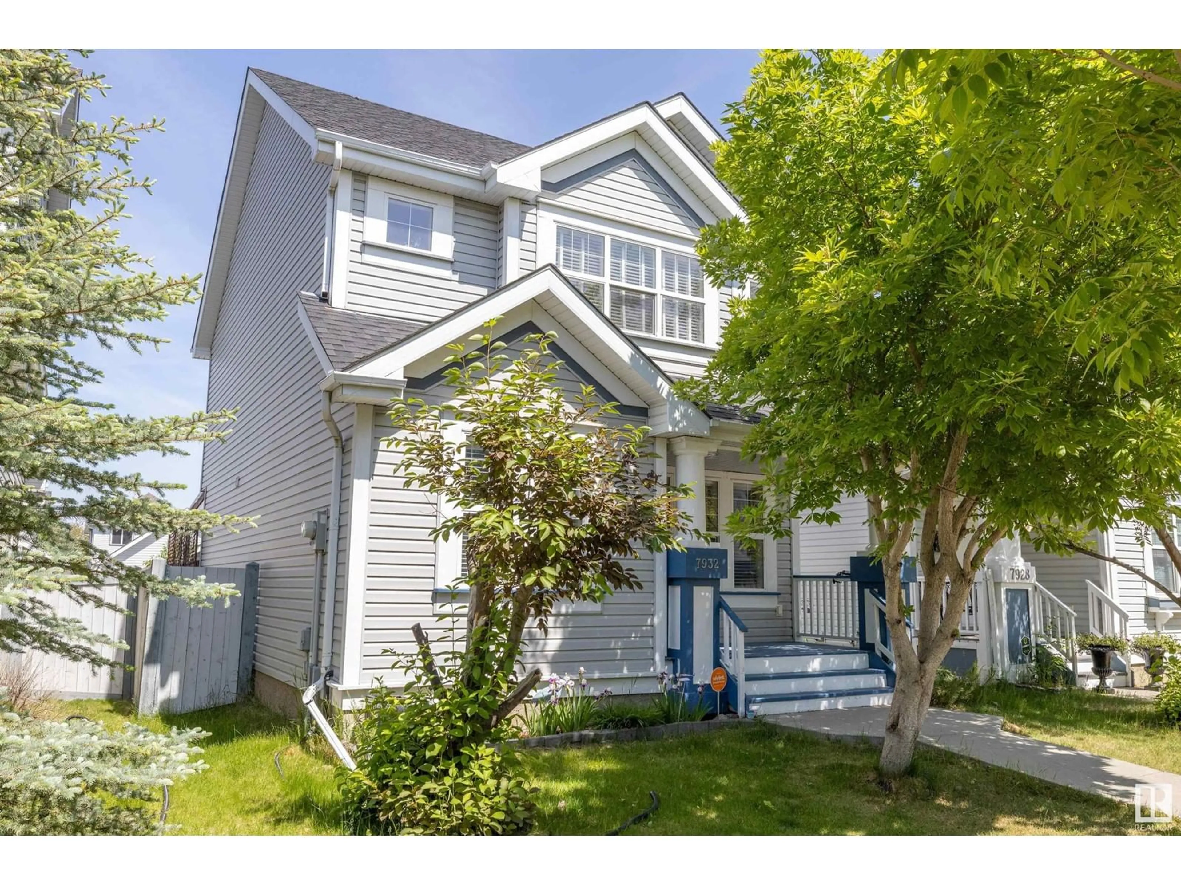 Home with vinyl exterior material, street for 7932 14 AVE, Edmonton Alberta T6X1H3