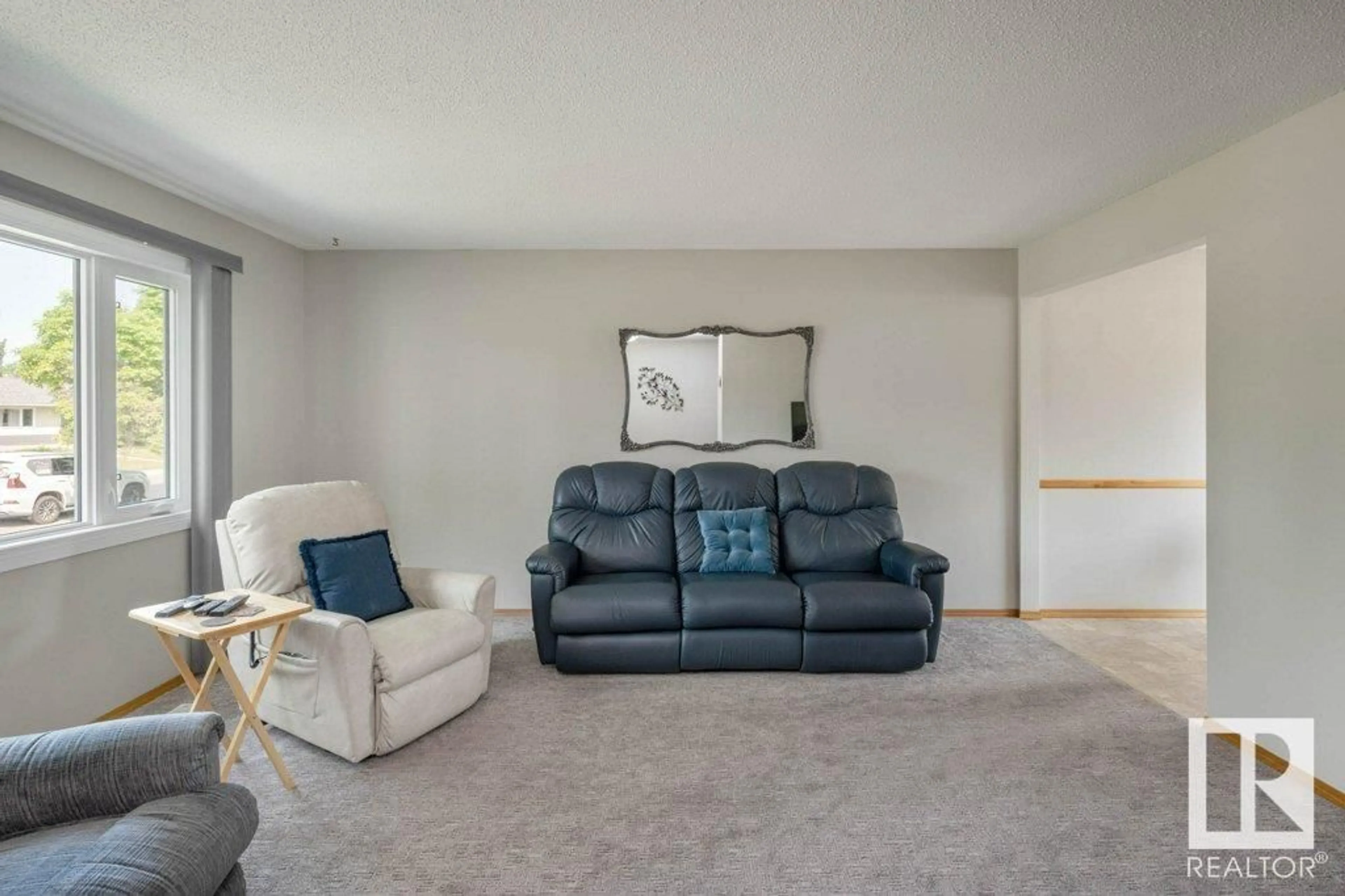 Living room with furniture, carpet floor for 7 CHIPPEWA RD, Leduc Alberta T9E4M9
