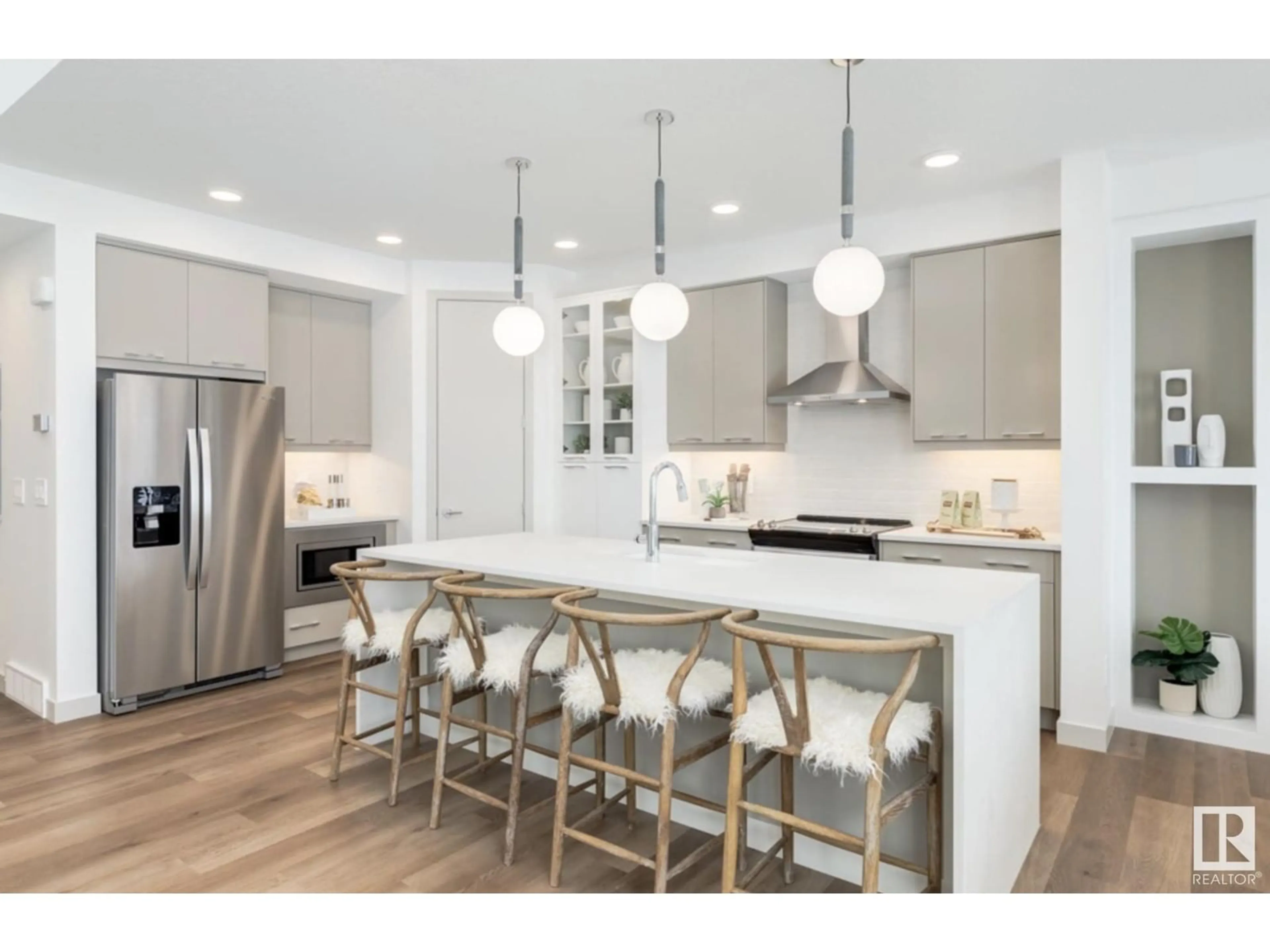 Open concept kitchen, wood/laminate floor for NW - 2235 194 ST, Edmonton Alberta T6M3B6