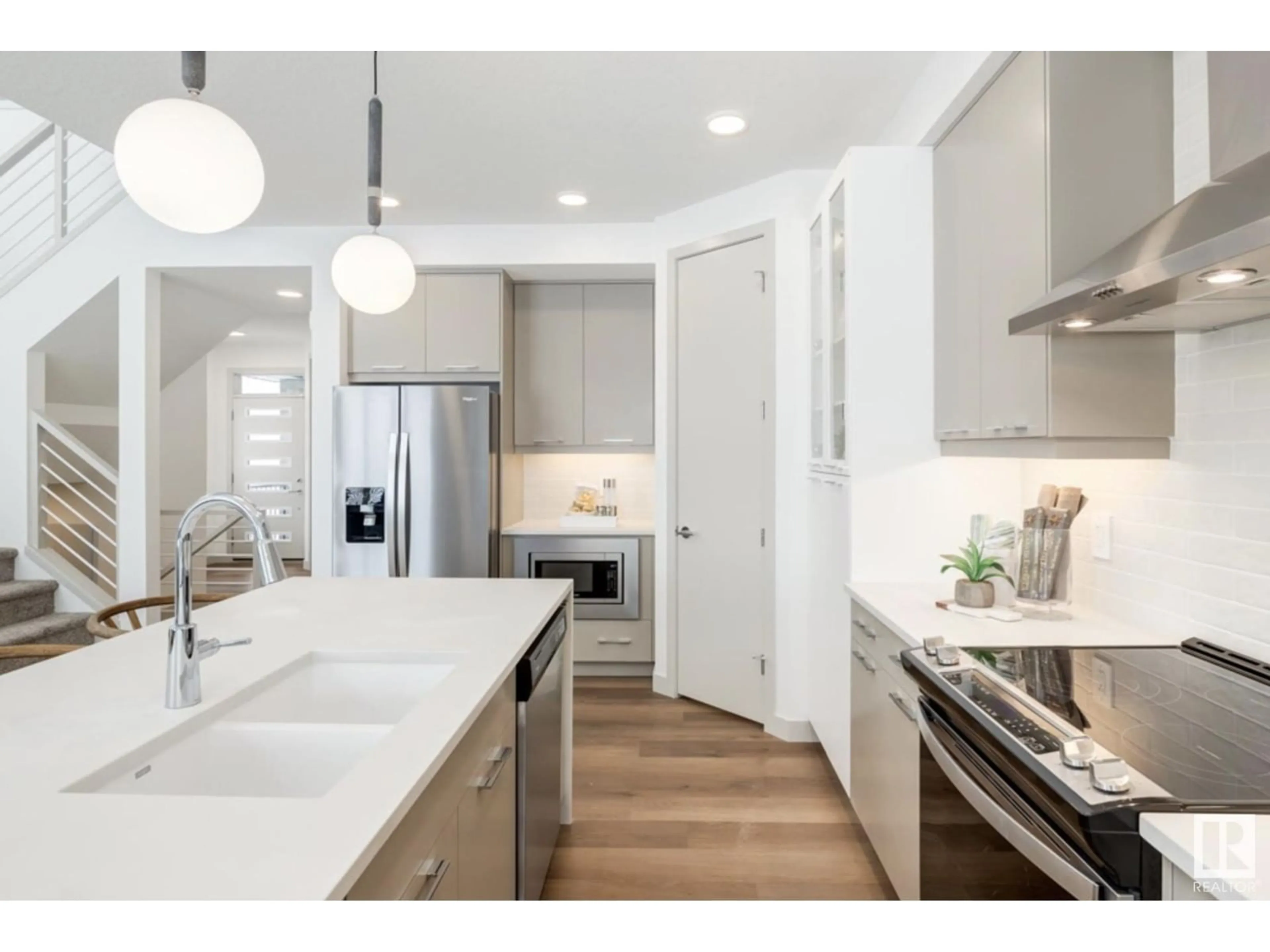 Open concept kitchen, ceramic/tile floor for NW - 2235 194 ST, Edmonton Alberta T6M3B6