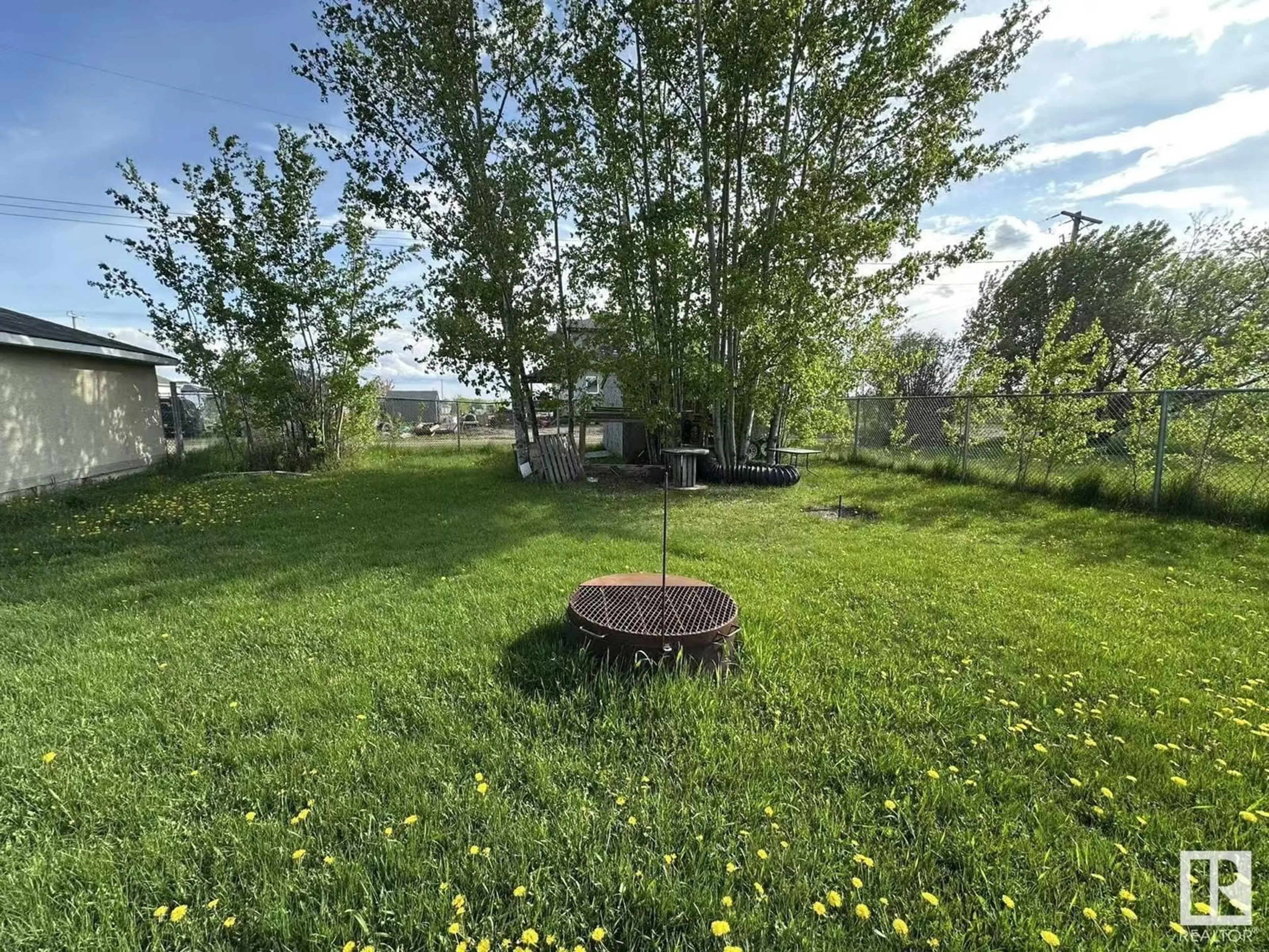 A pic from outside/outdoor area/front of a property/back of a property/a pic from drone, forest/trees view for 5013 49 AV, Egremont Alberta T0A0Z0