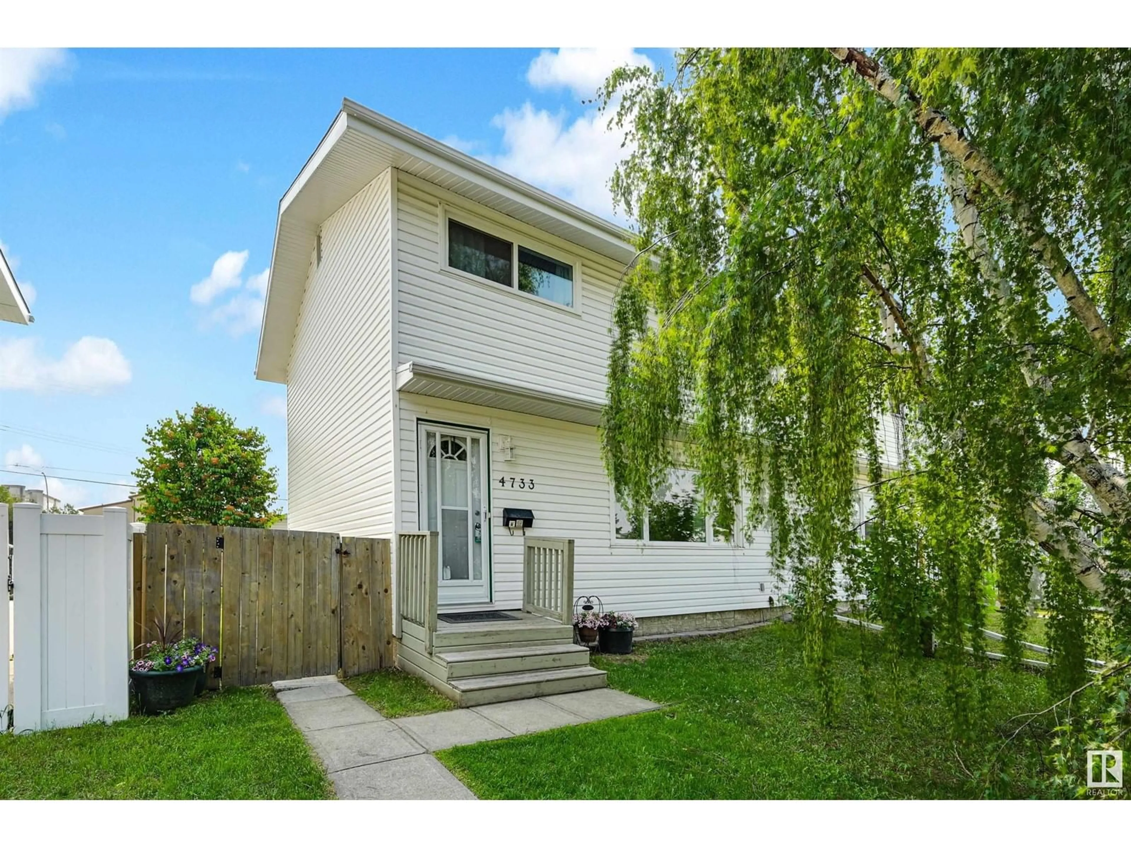Home with vinyl exterior material, street for 4733 105 ST, Edmonton Alberta T6H2M3