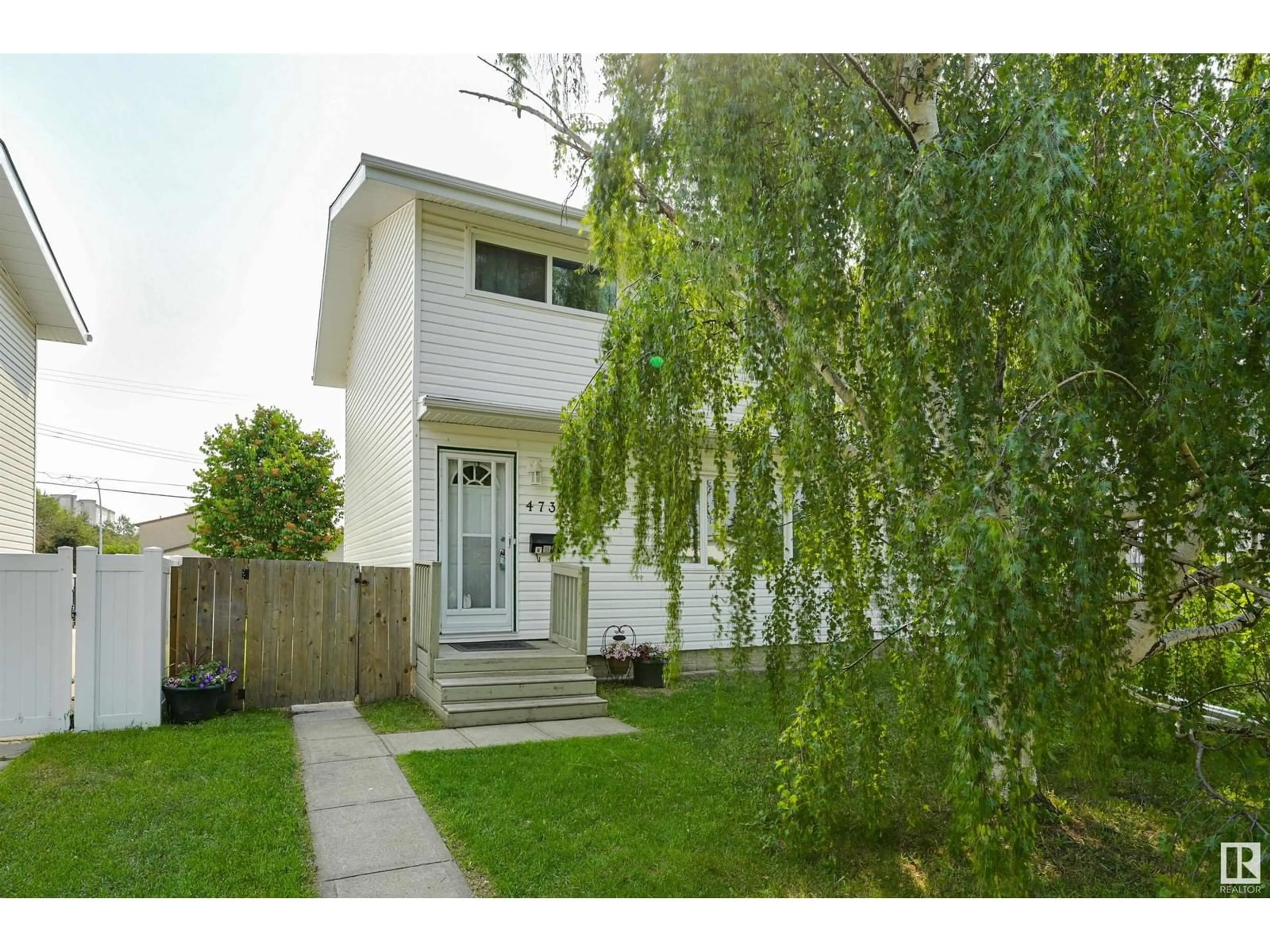 Home with vinyl exterior material, street for 4733 105 ST, Edmonton Alberta T6H2M3