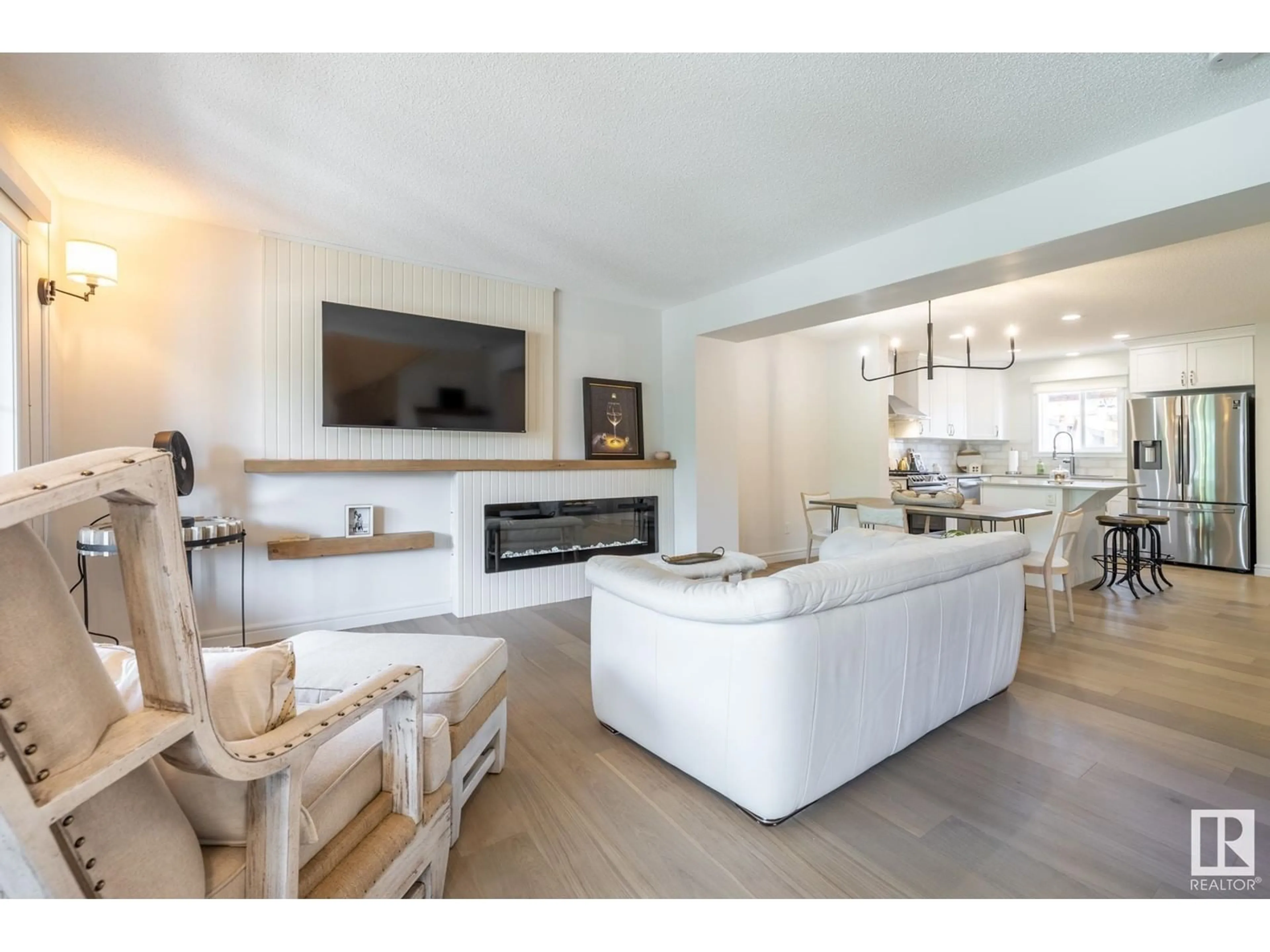 Living room with furniture, ceramic/tile floor for 2047 GRAYDON HILL CR, Edmonton Alberta T6W4C5