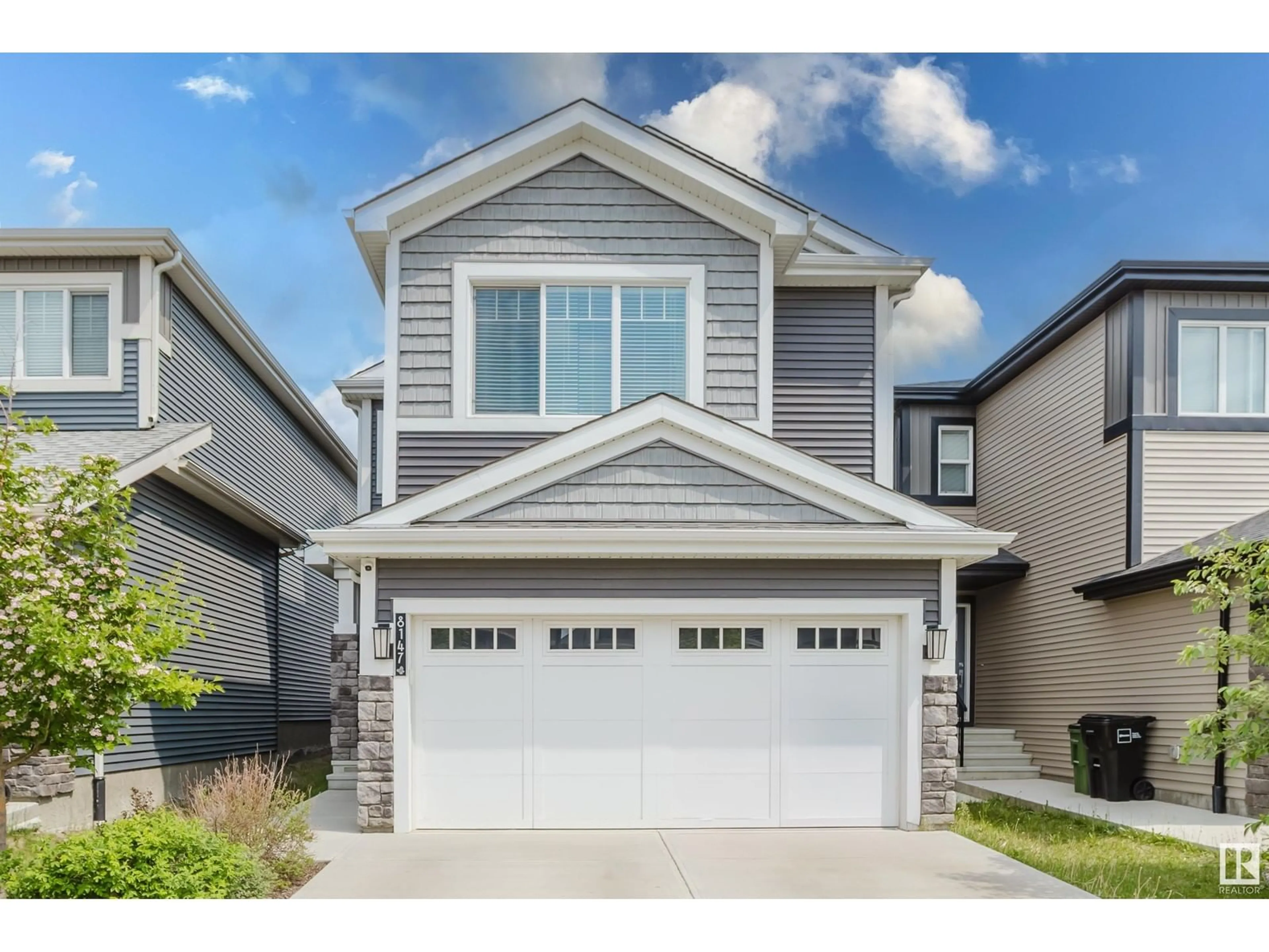 Home with vinyl exterior material, street for 8147 226 ST, Edmonton Alberta T5T7K9