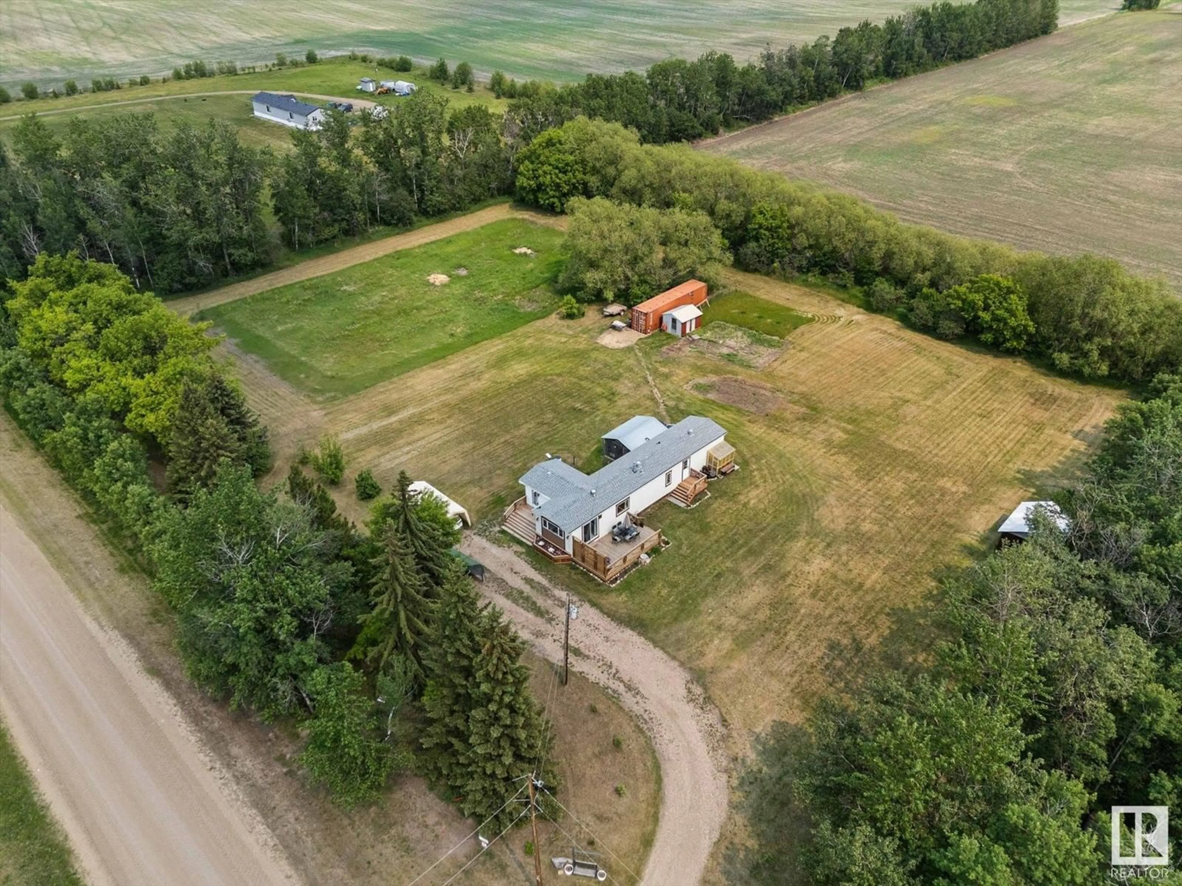A pic from outside/outdoor area/front of a property/back of a property/a pic from drone, unknown for 58429 RGE ROAD 245, Rural Westlock County Alberta T0G1L0