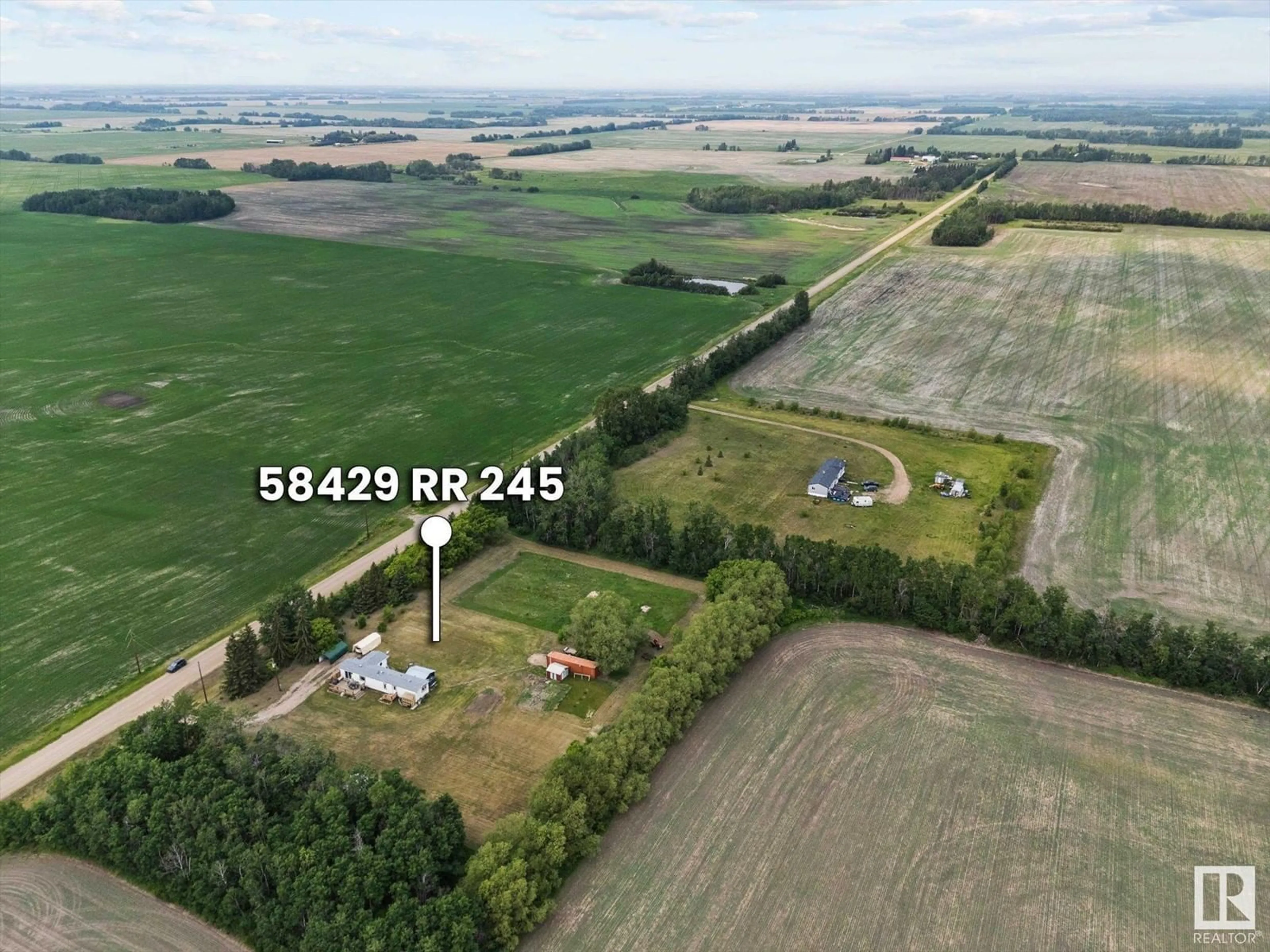 A pic from outside/outdoor area/front of a property/back of a property/a pic from drone, building for 58429 RGE ROAD 245, Rural Westlock County Alberta T0G1L0