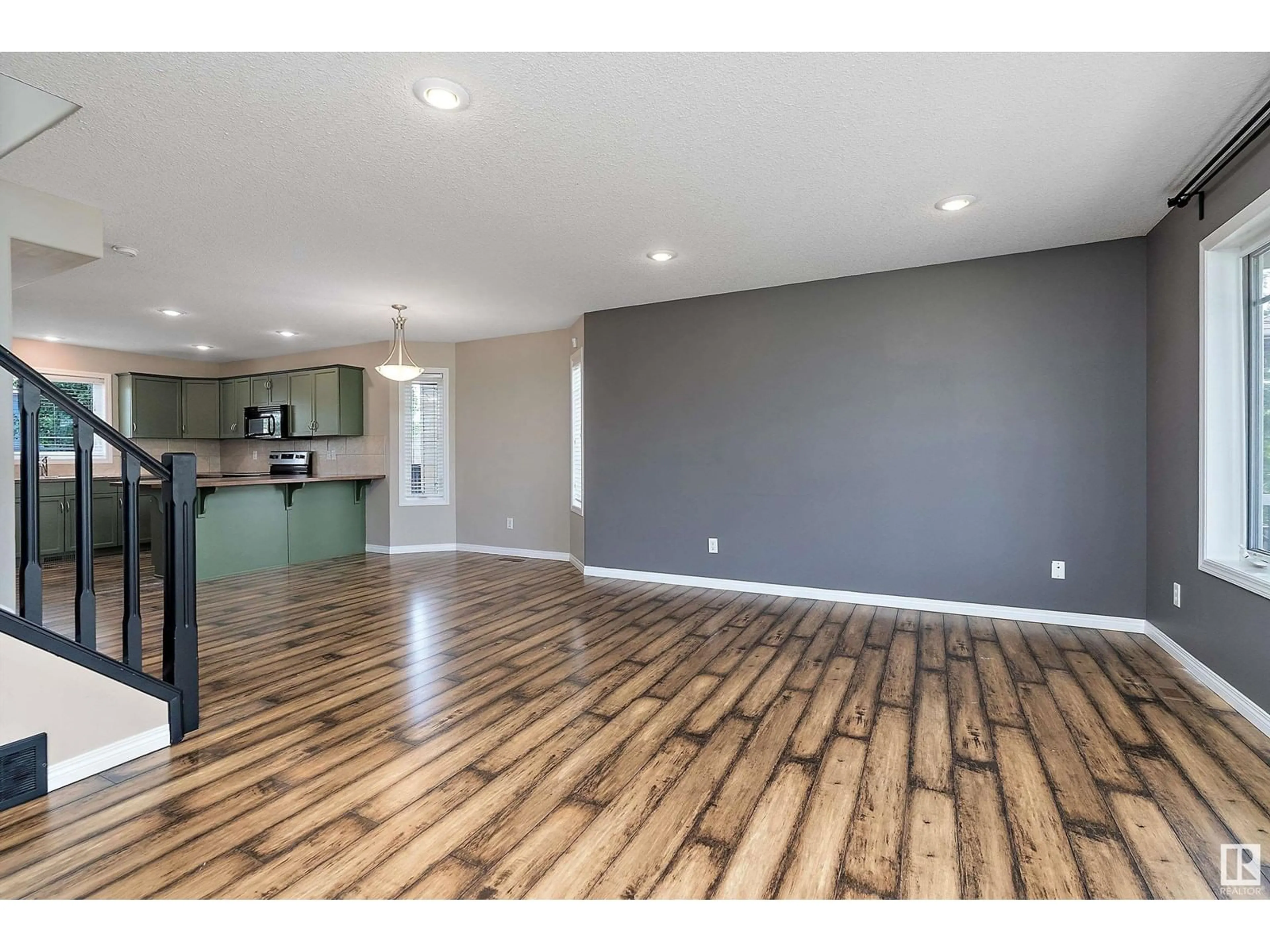 Open concept kitchen, wood/laminate floor for PM - 15 SUNTREE, Leduc Alberta T9E8R7