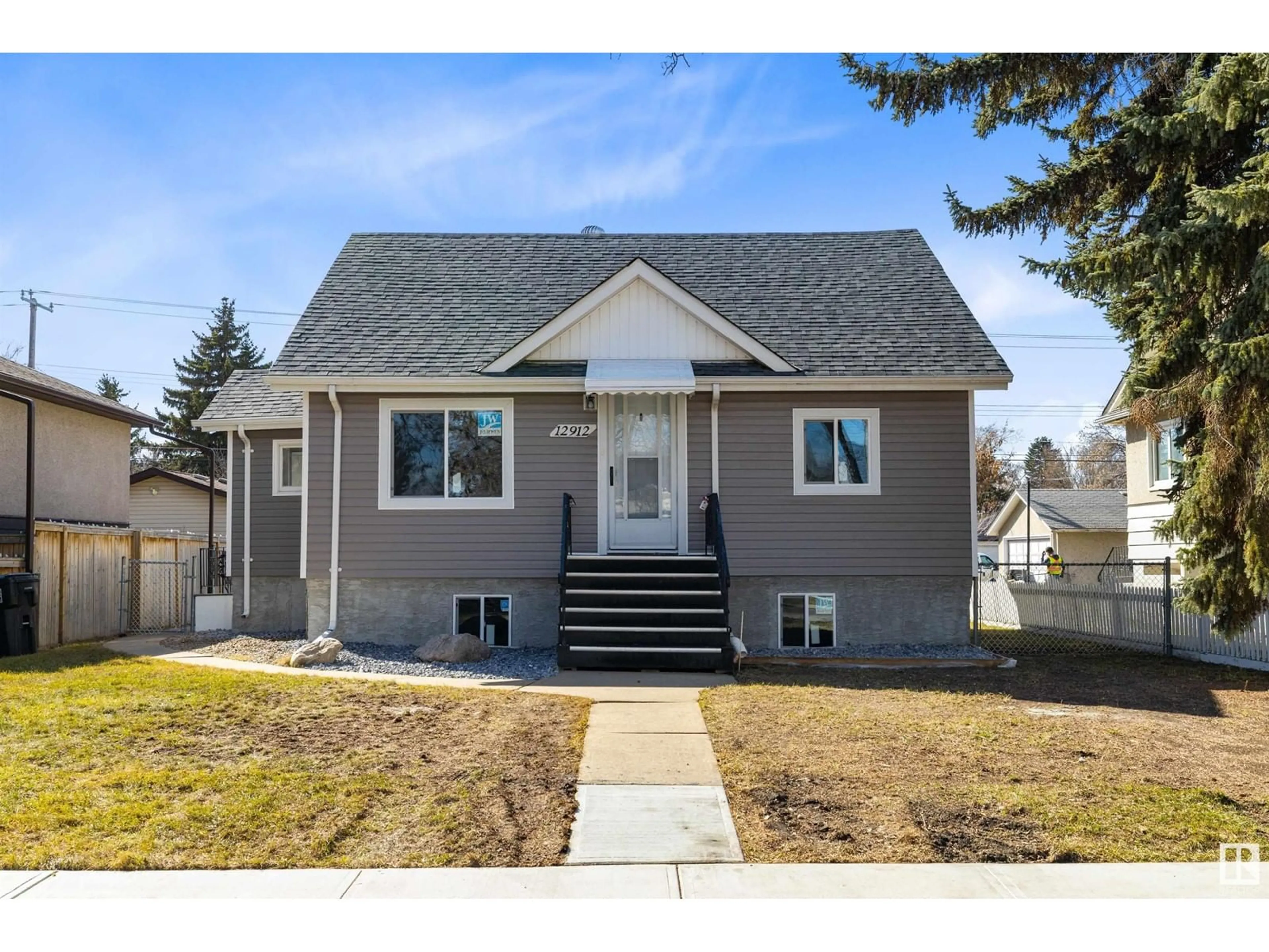 Home with vinyl exterior material, street for 12912 123A ST, Edmonton Alberta T5L0K9