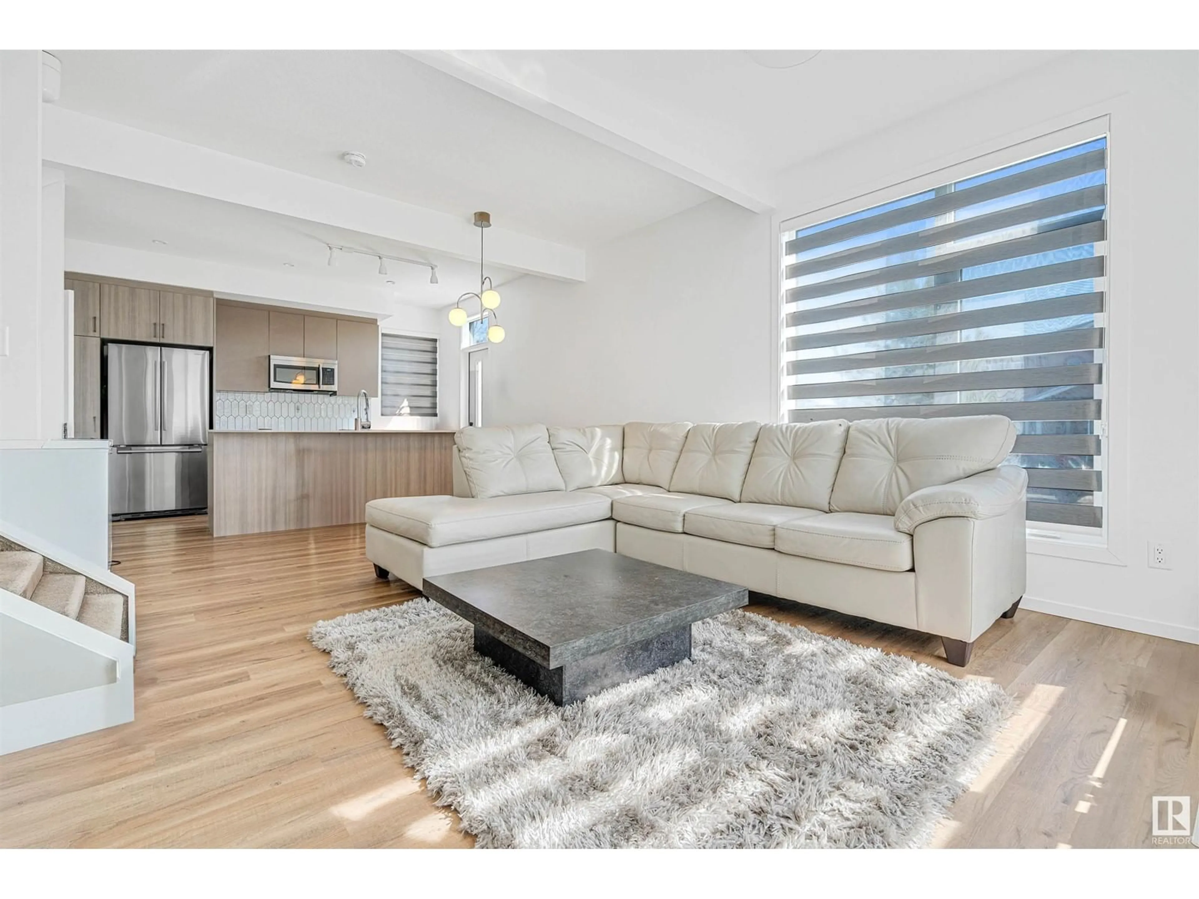 Living room with furniture, unknown for NW - 16204 102 AV, Edmonton Alberta T5P0N6