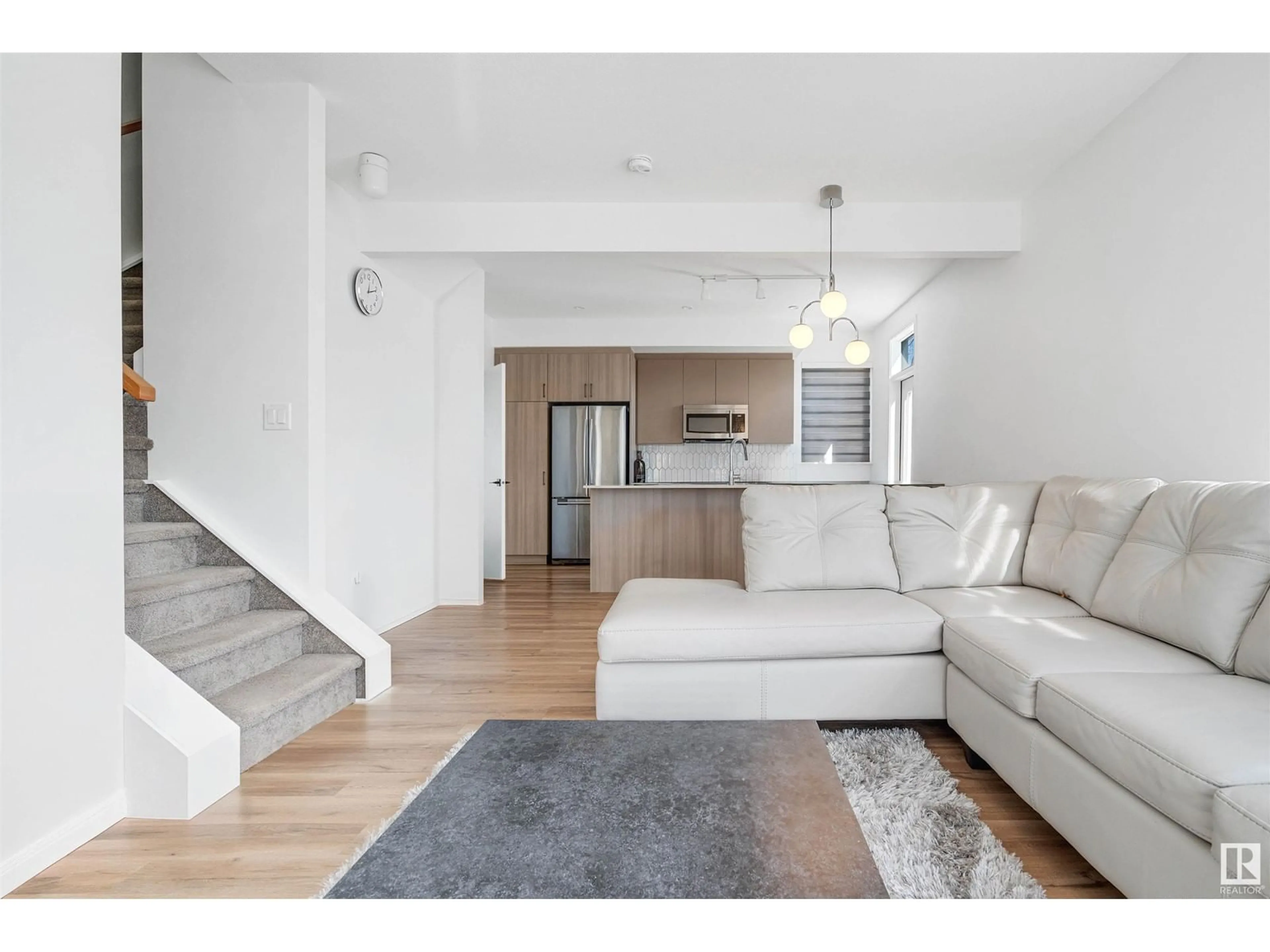 Living room with furniture, unknown for NW - 16204 102 AV, Edmonton Alberta T5P0N6