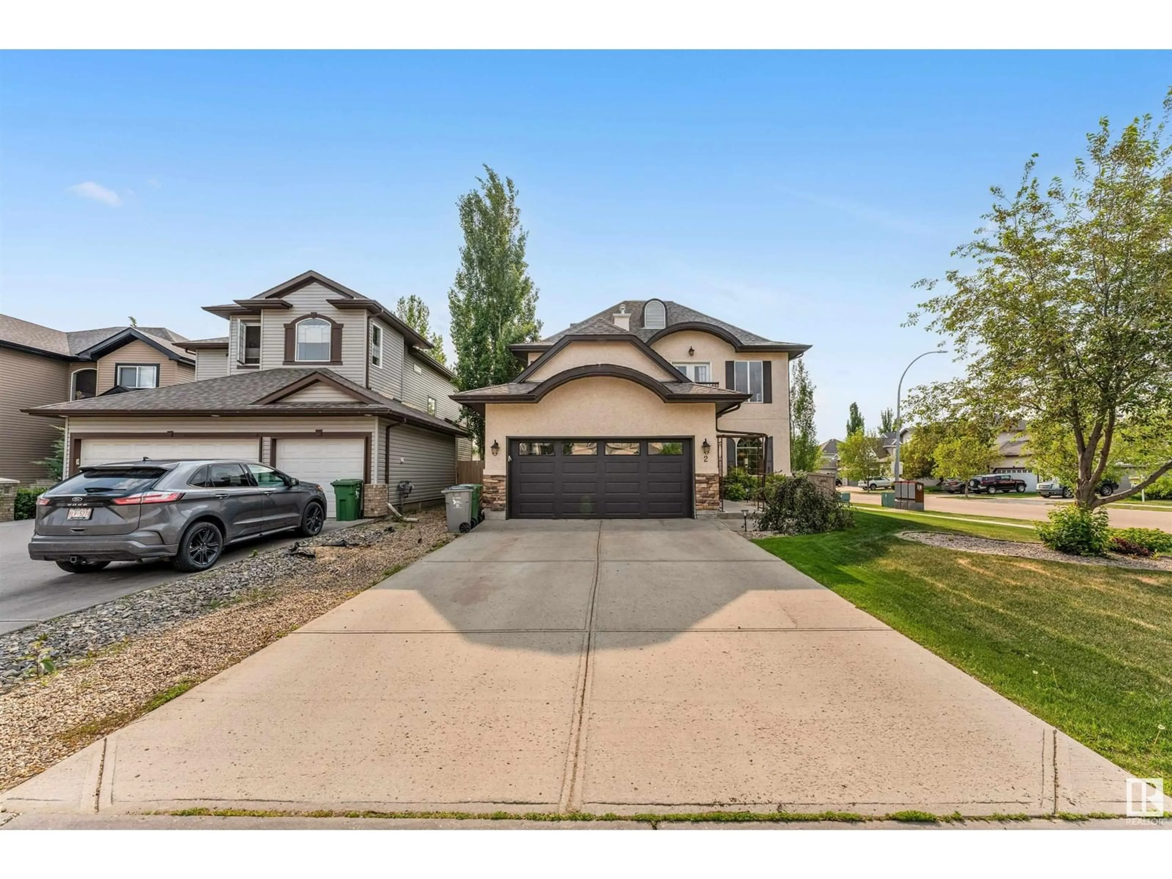 A pic from outside/outdoor area/front of a property/back of a property/a pic from drone, street for 2 ROCHE PL, Beaumont Alberta T4X0B8