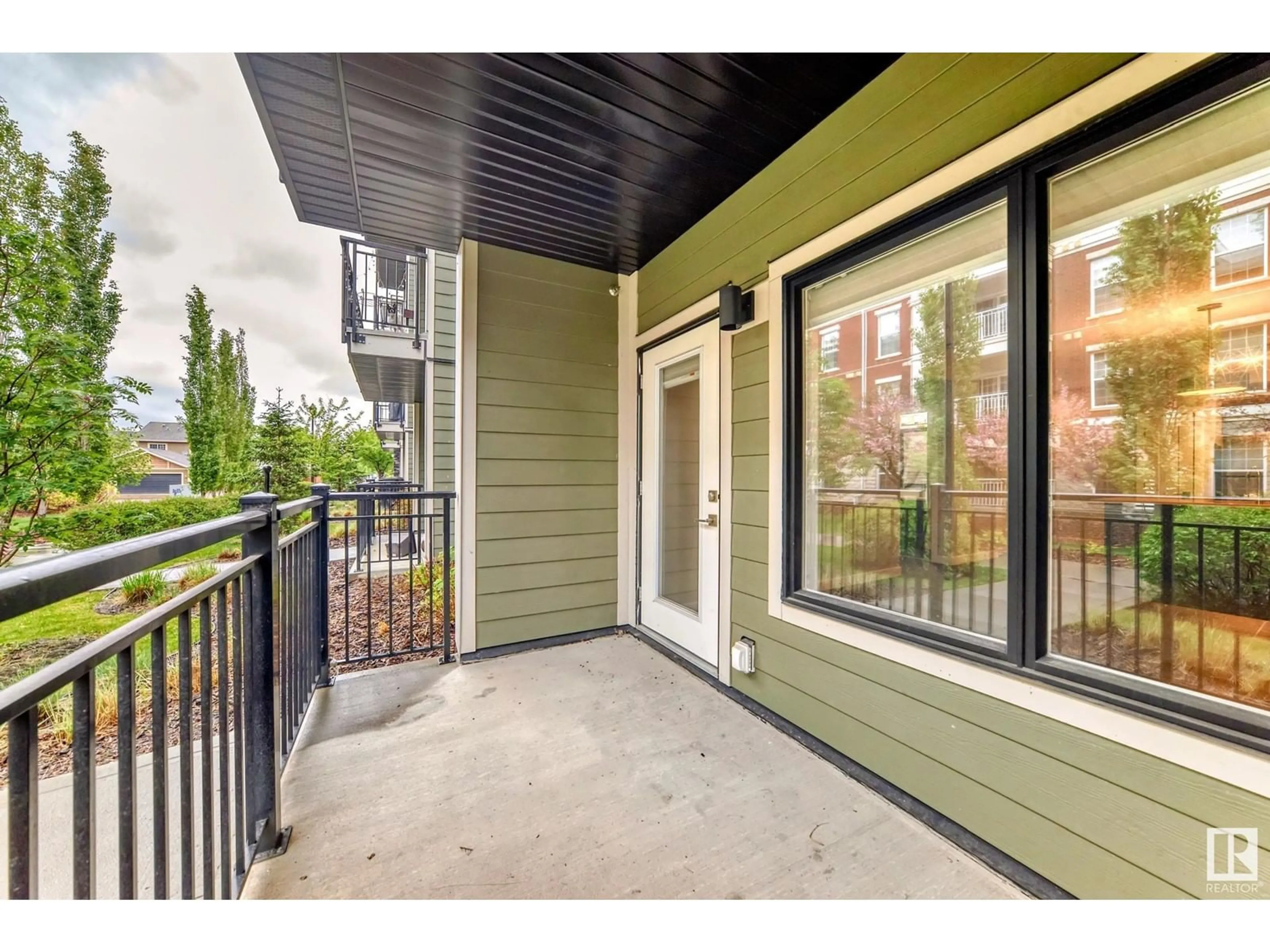 Patio, street for 114 - 560 GRIESBACH PARADE PR, Edmonton Alberta T5E6X1