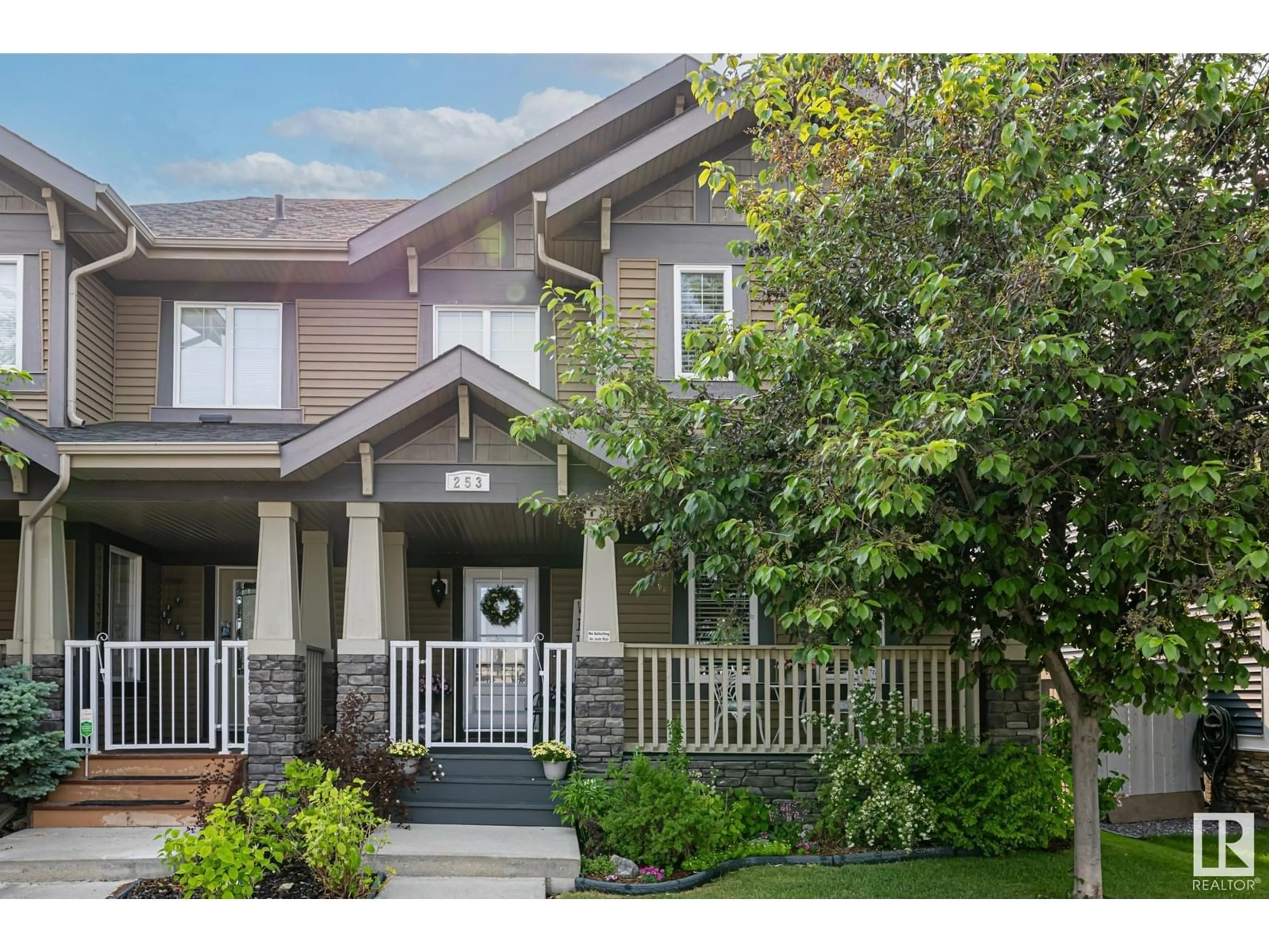 Home with vinyl exterior material, street for 253 GRIESBACH RD, Edmonton Alberta T5E6S5