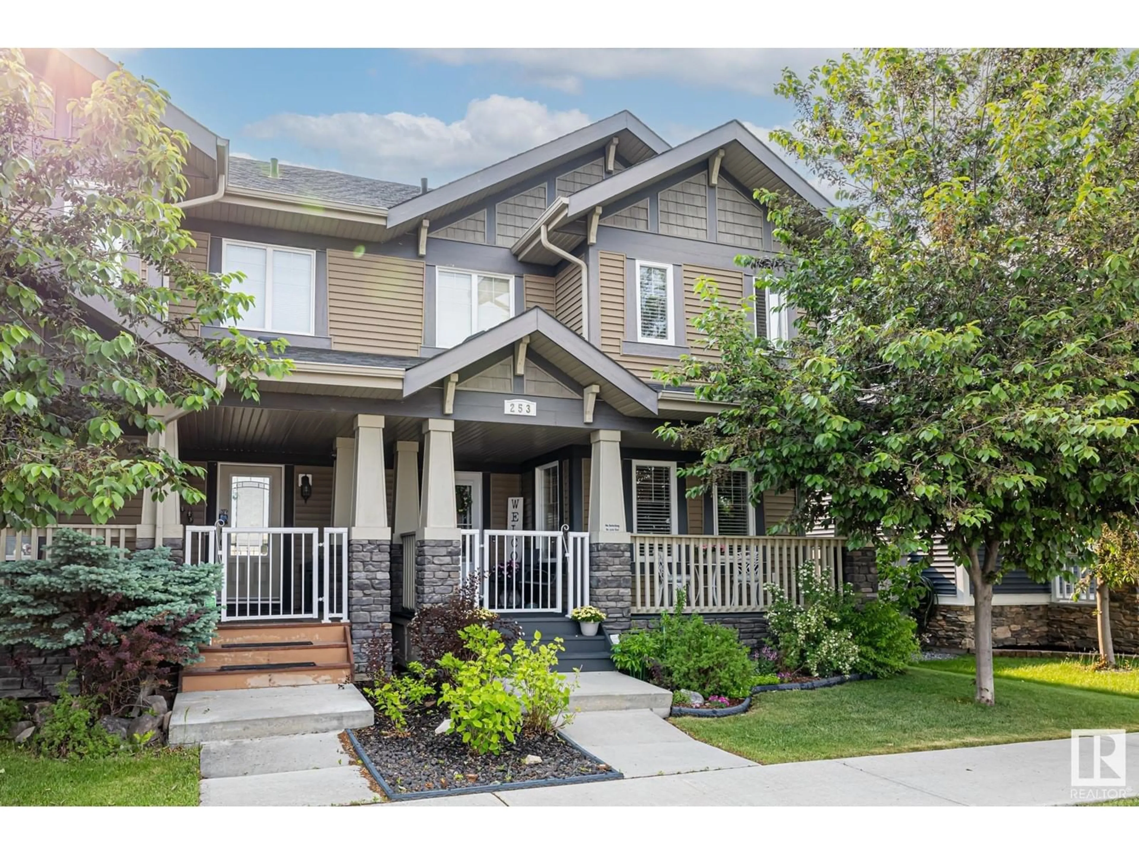 Home with vinyl exterior material, street for 253 GRIESBACH RD, Edmonton Alberta T5E6S5