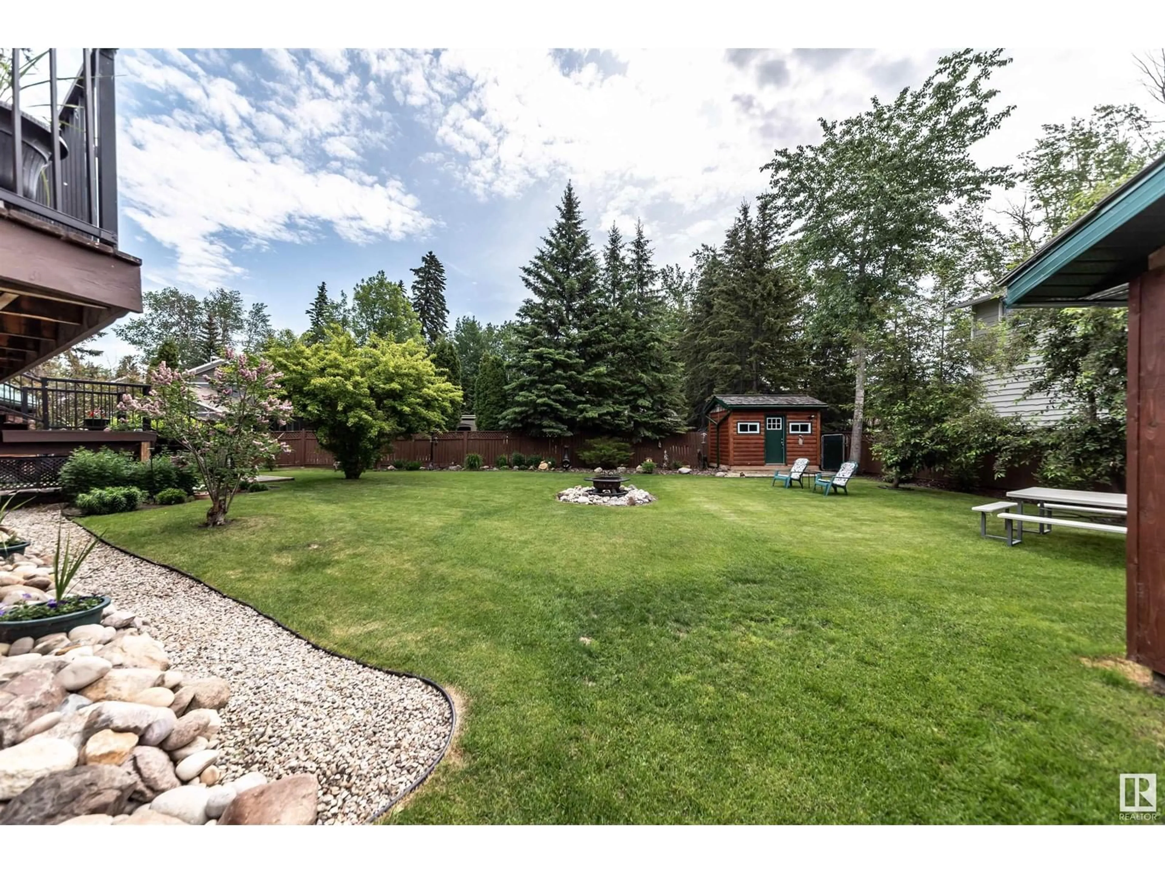 A pic from outside/outdoor area/front of a property/back of a property/a pic from drone, unknown for 4815 49A AV, Rural Lac Ste. Anne County Alberta T0E0A0