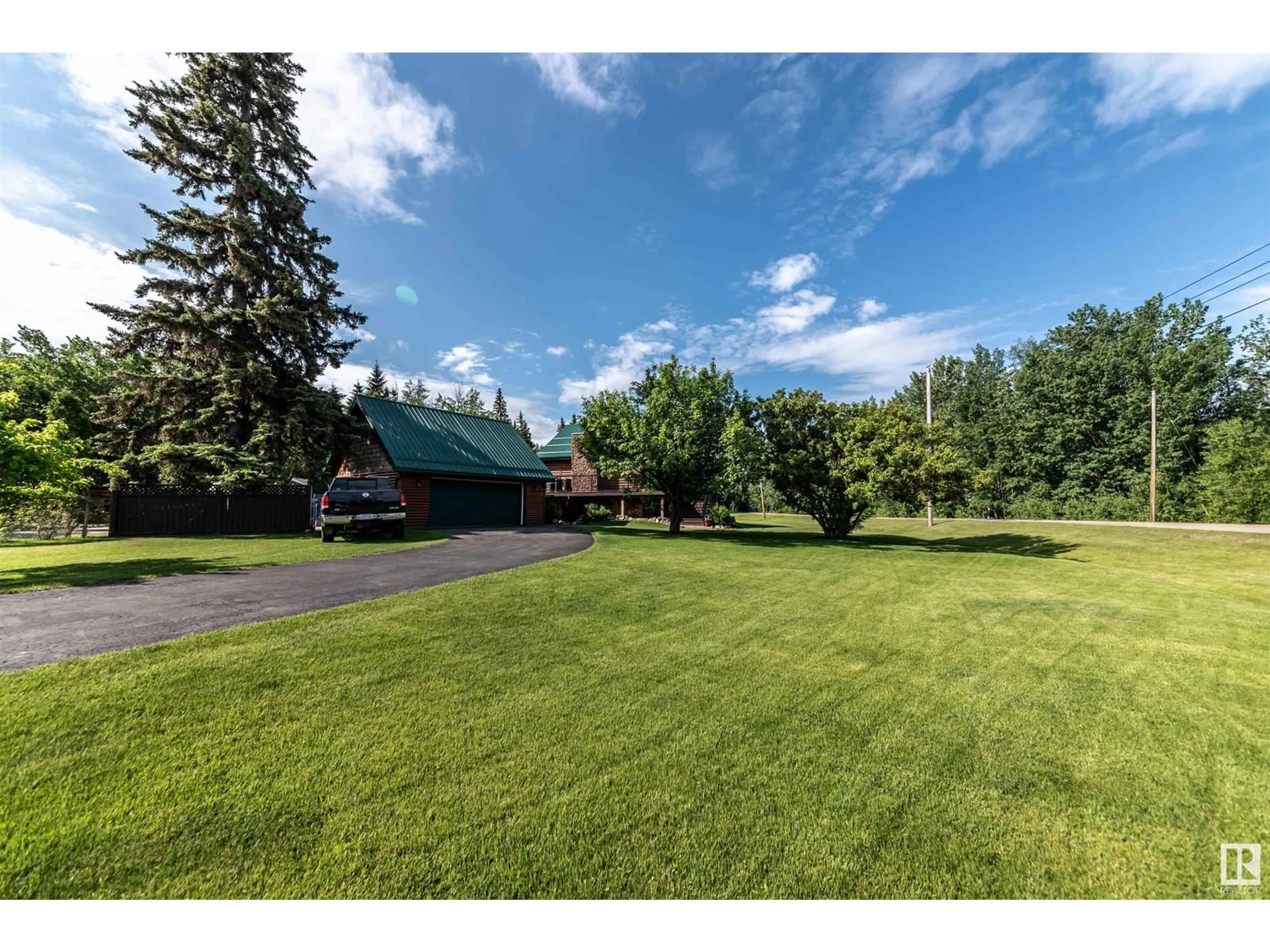 A pic from outside/outdoor area/front of a property/back of a property/a pic from drone, mountain view for 4815 49A AV, Rural Lac Ste. Anne County Alberta T0E0A0