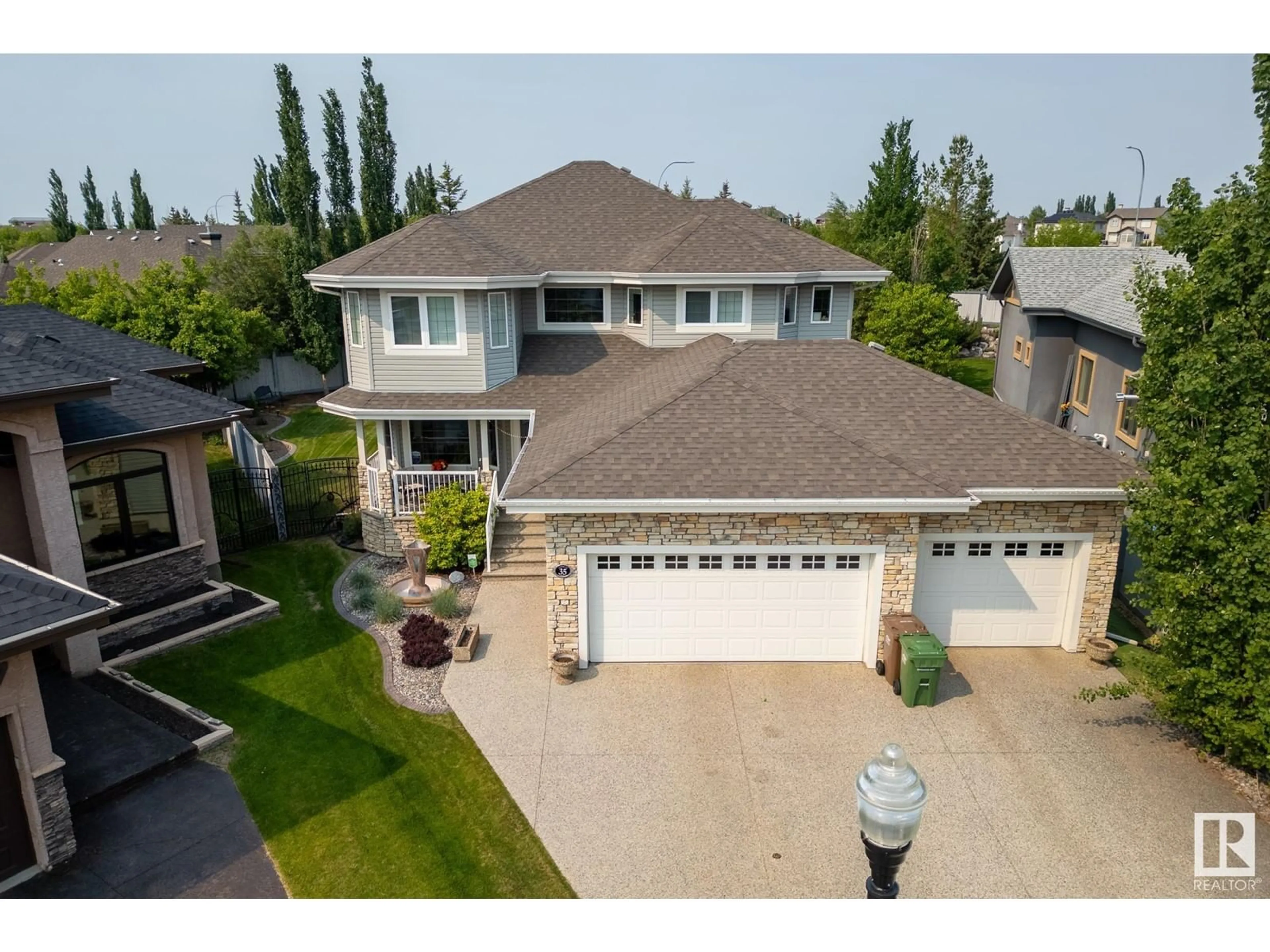 A pic from outside/outdoor area/front of a property/back of a property/a pic from drone, street for 35 LOISELLE WY, St. Albert Alberta T8N3C4