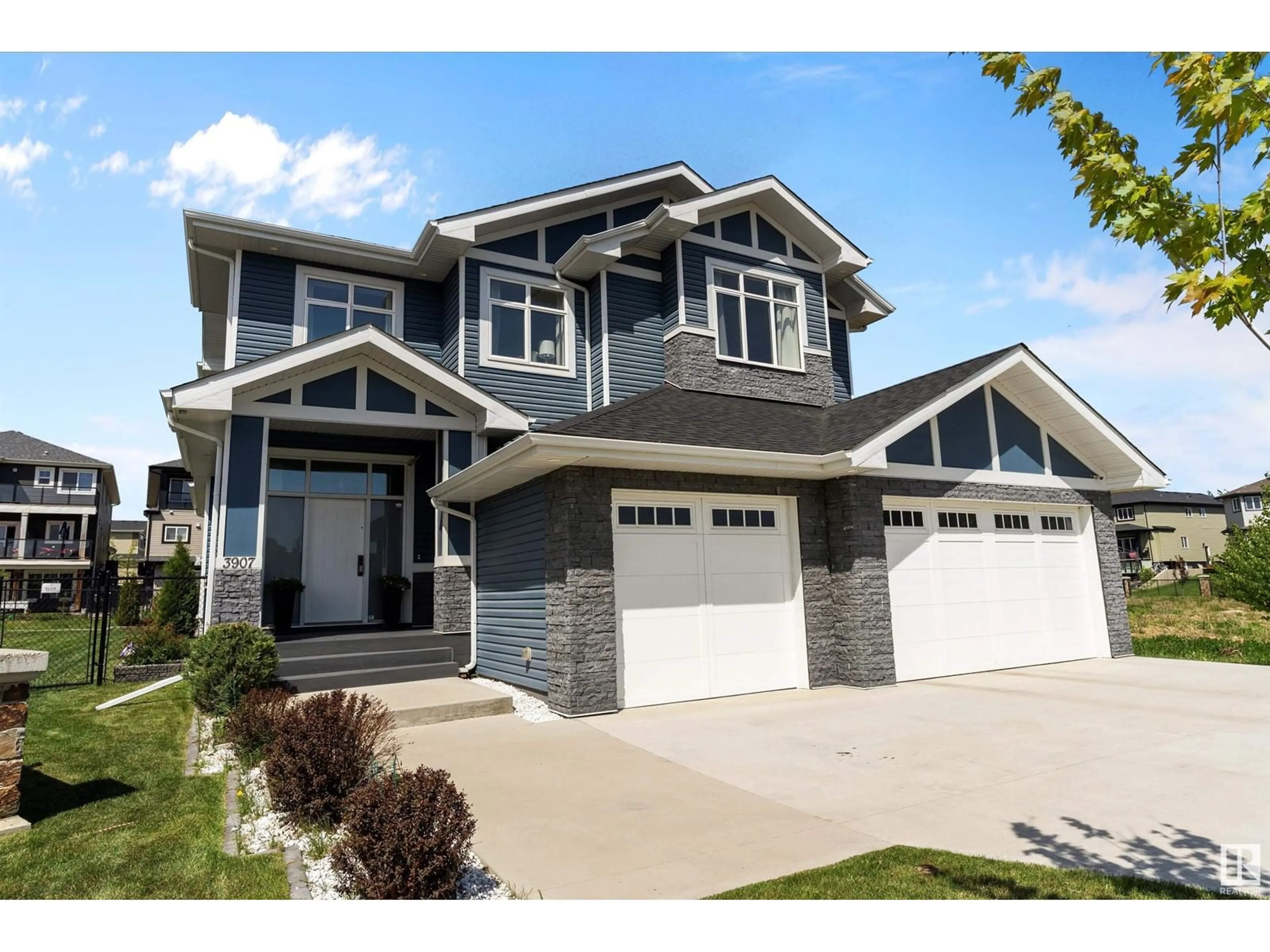 Home with vinyl exterior material, street for 3907 47 AV, Beaumont Alberta T4X1X7