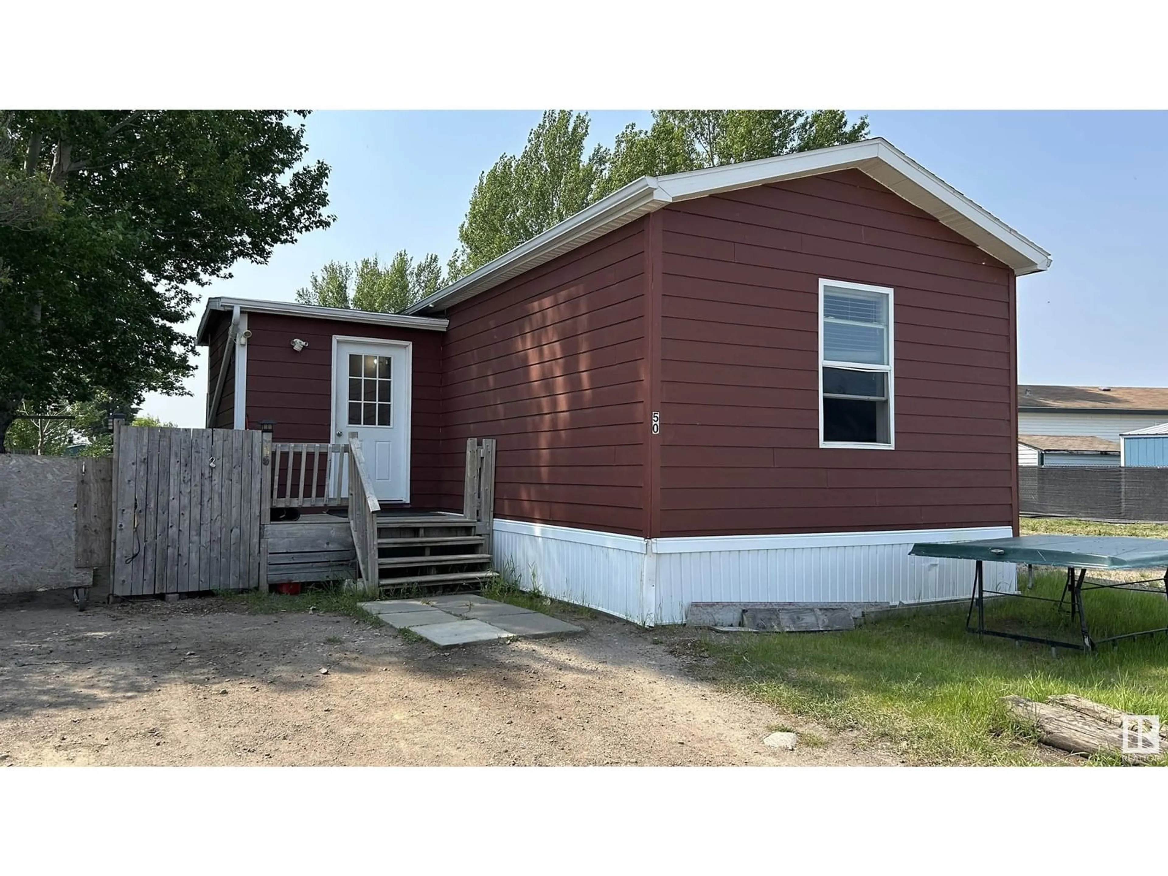 Home with vinyl exterior material, street for 50 - 5508 55 ST, Bonnyville Town Alberta T9N2C6