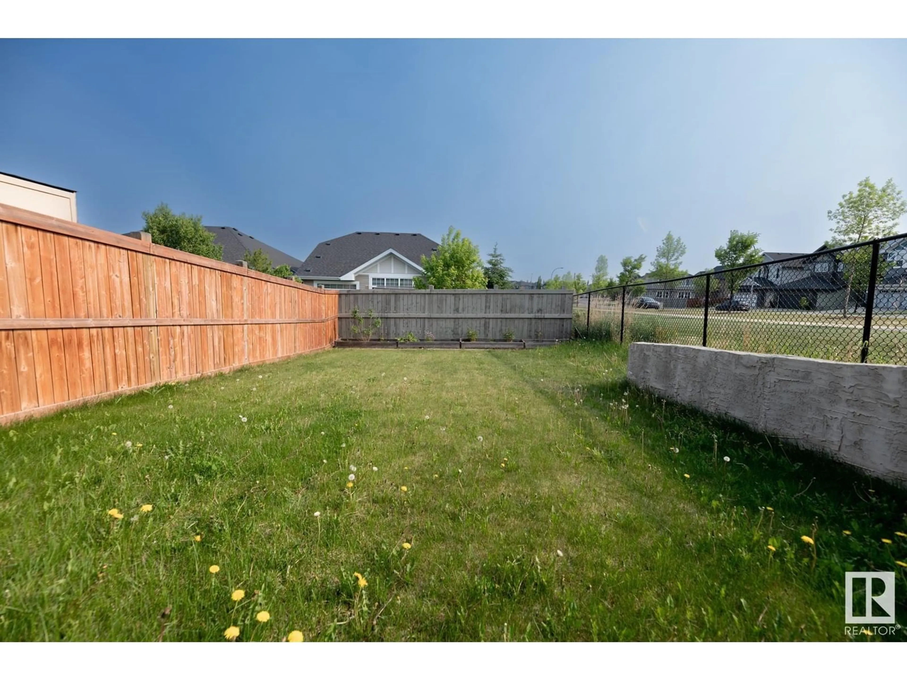 A pic from outside/outdoor area/front of a property/back of a property/a pic from drone, mountain view for 87 AVEBURY, Sherwood Park Alberta T8H0Z3