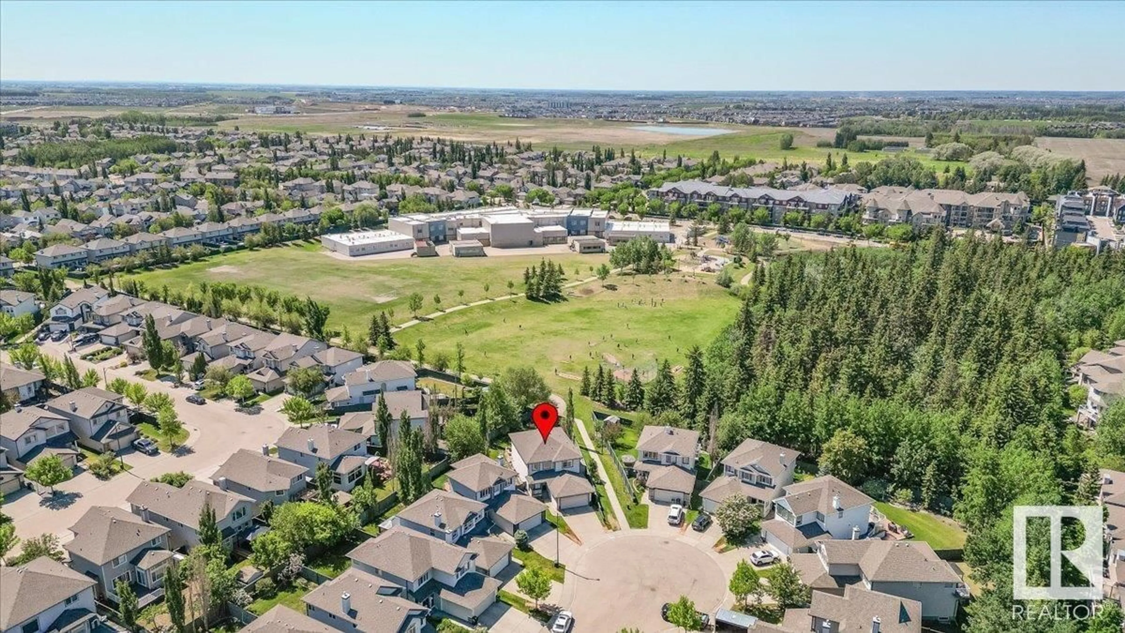 A pic from outside/outdoor area/front of a property/back of a property/a pic from drone, mountain view for 1717 ROBERTSON PL, Edmonton Alberta T6W1H8