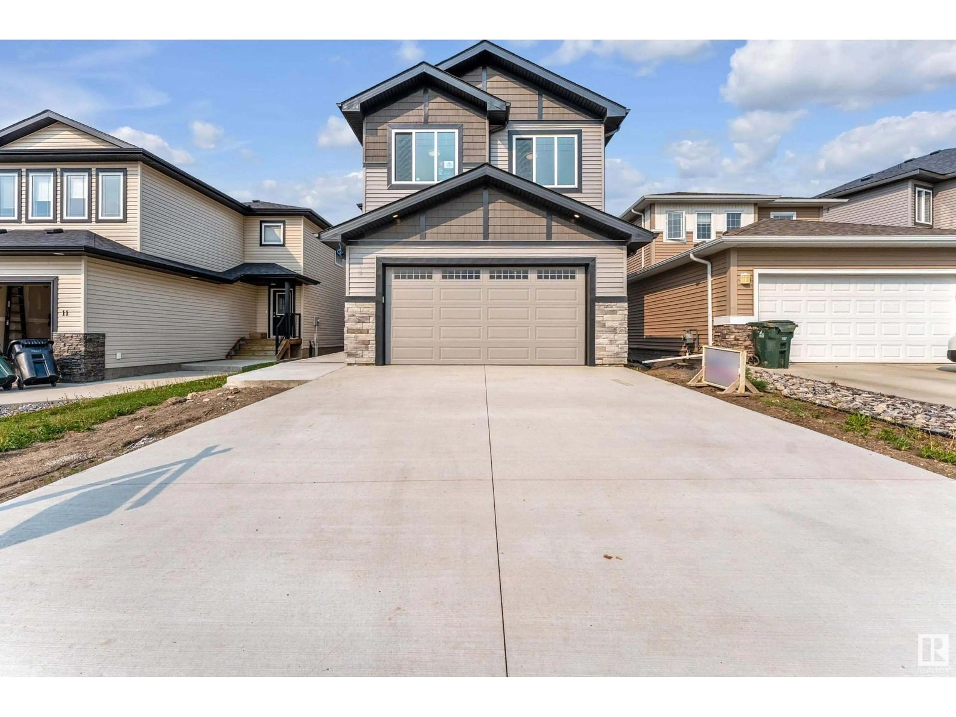 Home with vinyl exterior material, street for 13 HULL WD, Spruce Grove Alberta T7X0X5