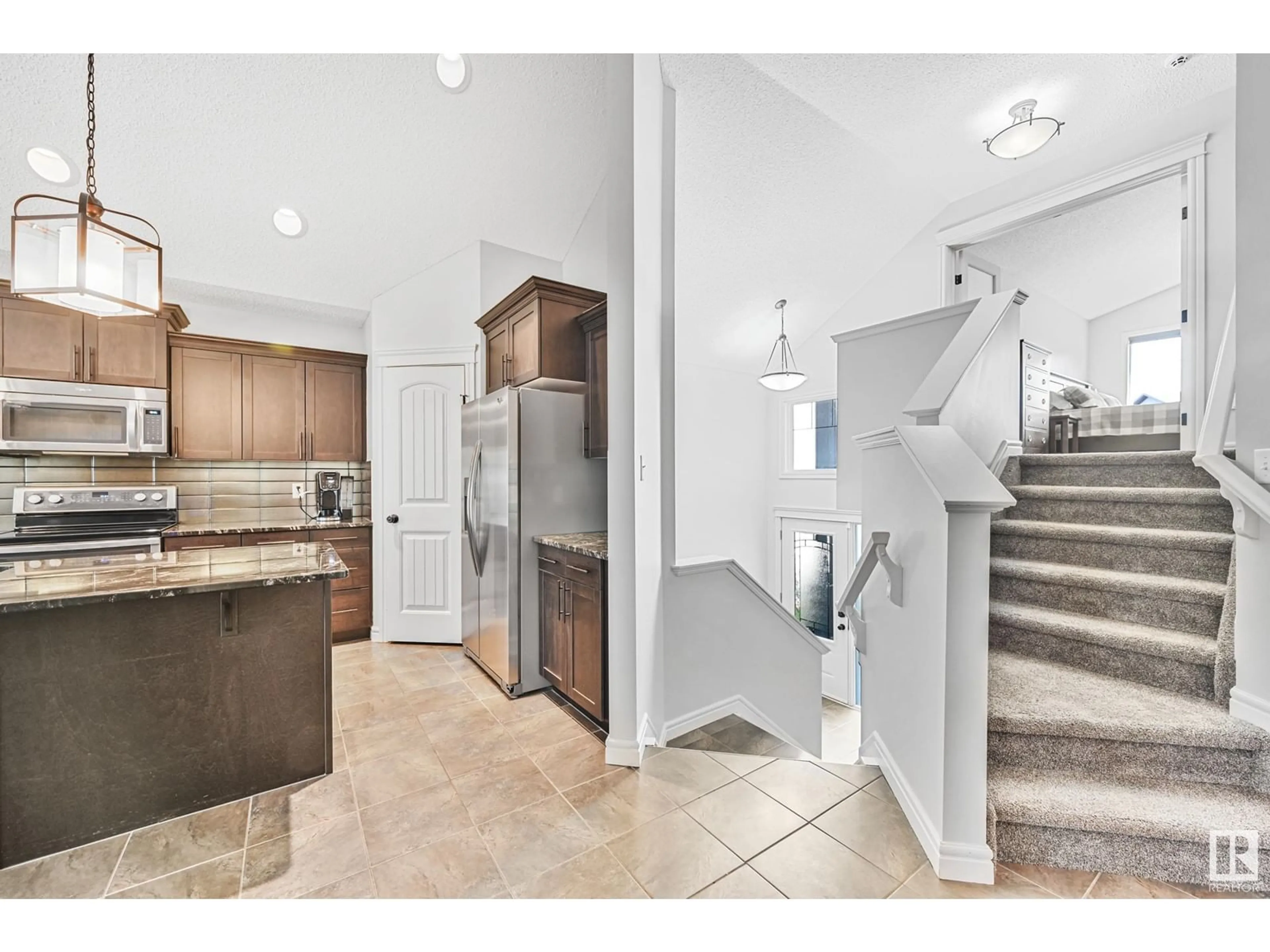 Open concept kitchen, ceramic/tile floor for 353 STILL CREEK CR, Sherwood Park Alberta T8H0S7