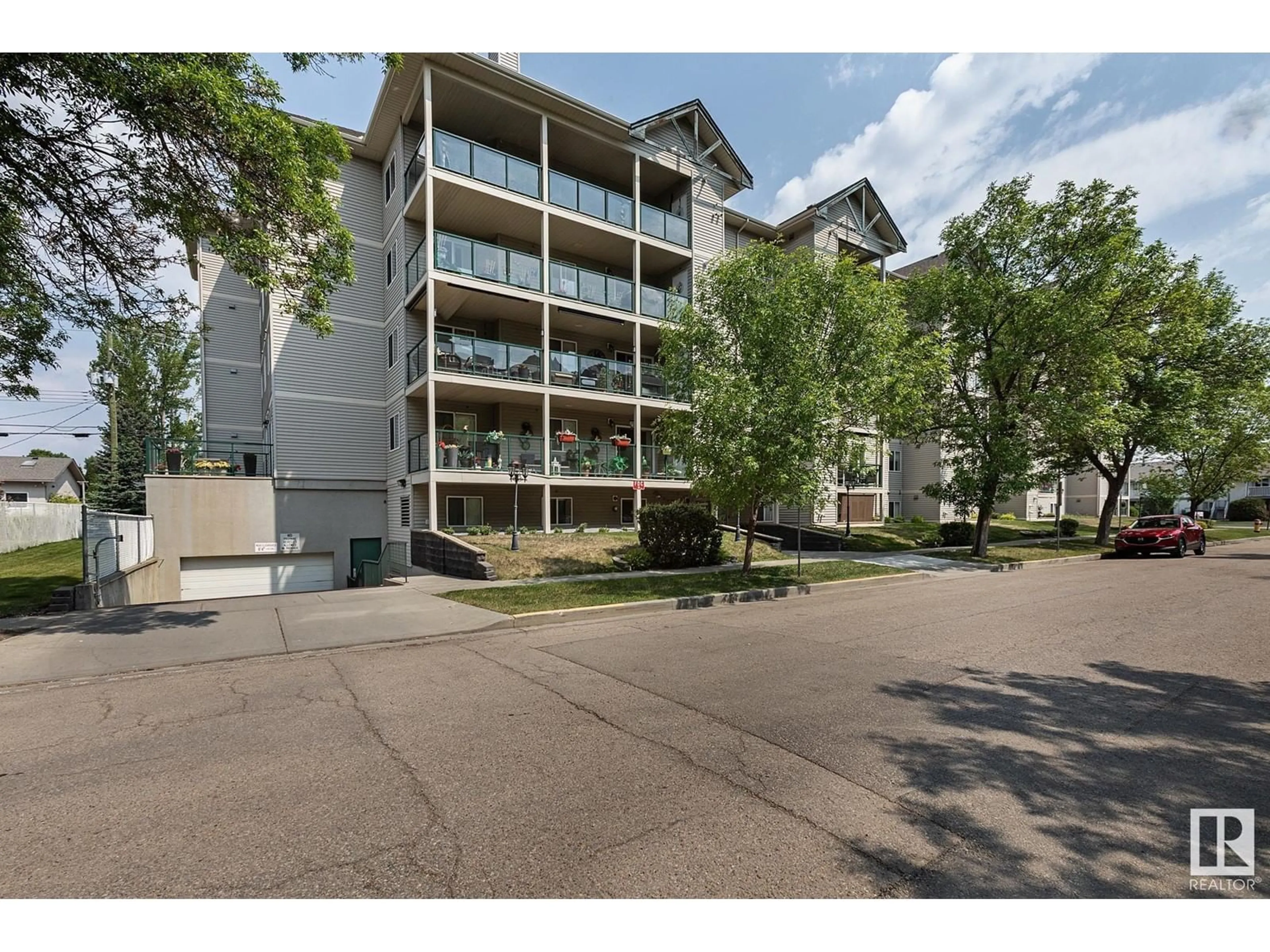 A pic from outside/outdoor area/front of a property/back of a property/a pic from drone, street for 208 - 4806 48 AV, Leduc Alberta T9E8S2
