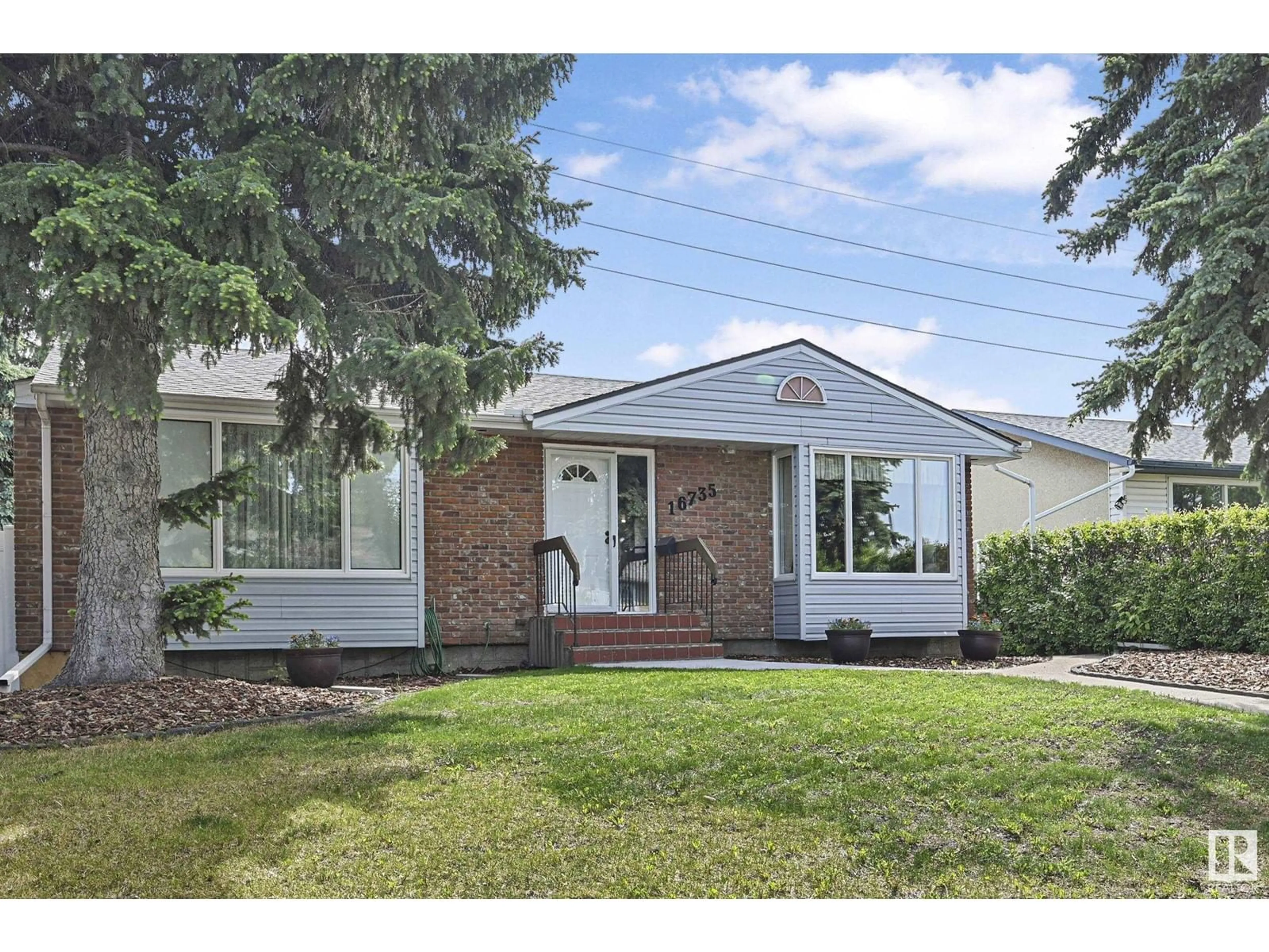 Home with brick exterior material, street for 16735 79A AV, Edmonton Alberta T5R3J4