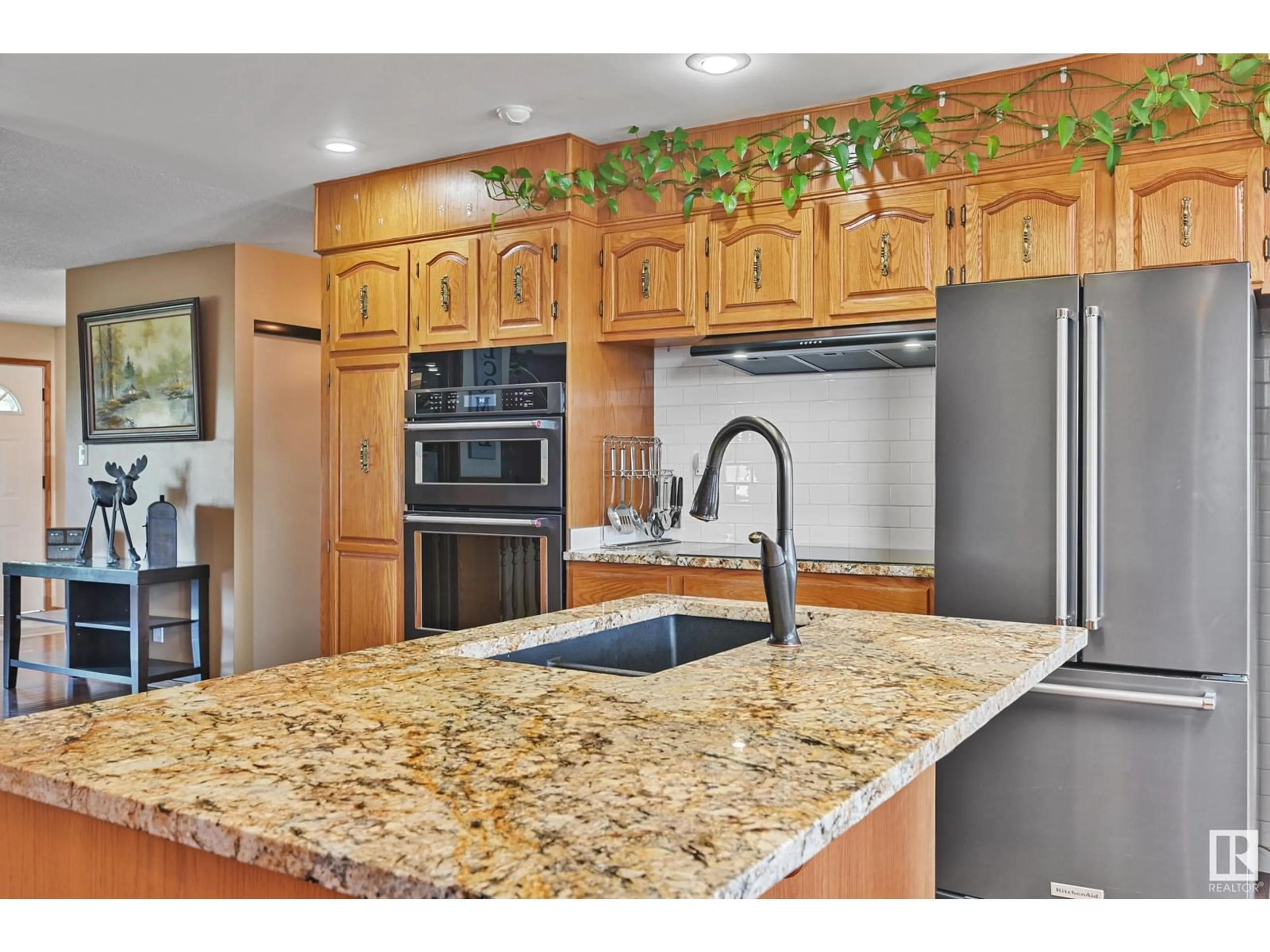 Open concept kitchen, ceramic/tile floor for 16735 79A AV, Edmonton Alberta T5R3J4