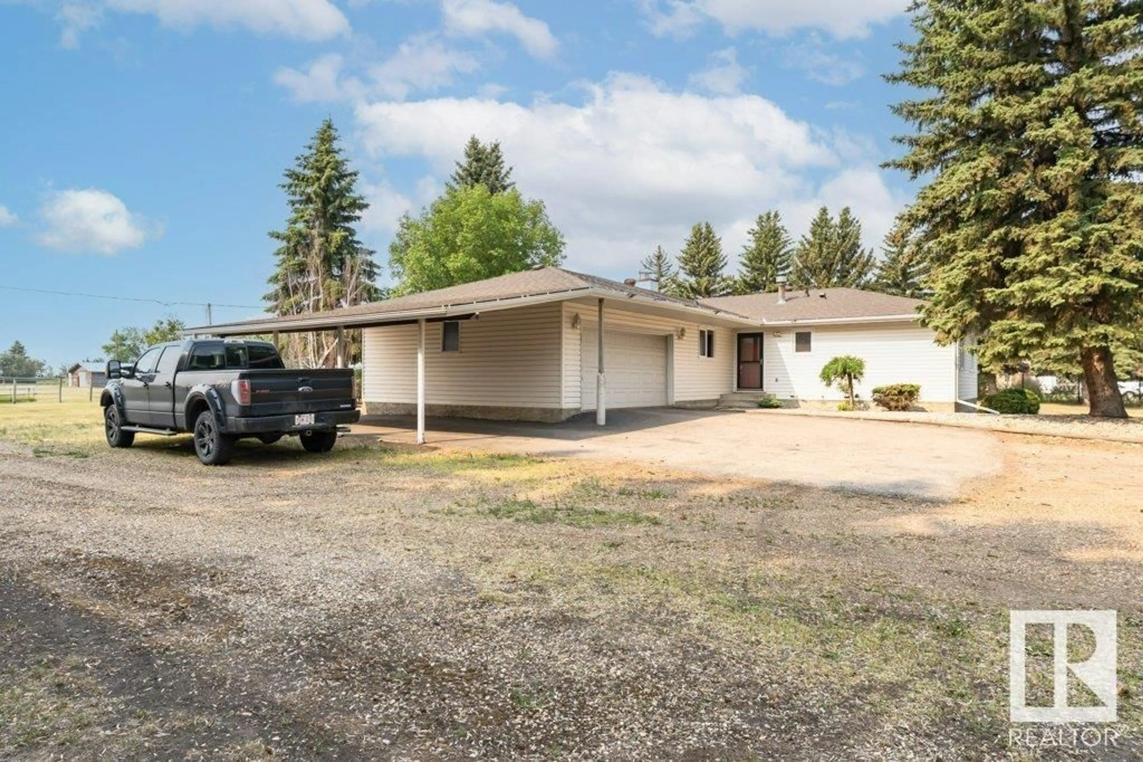 A pic from outside/outdoor area/front of a property/back of a property/a pic from drone, street for #15 - 54150 RGE ROAD 224, Rural Strathcona County Alberta T8L3Y5