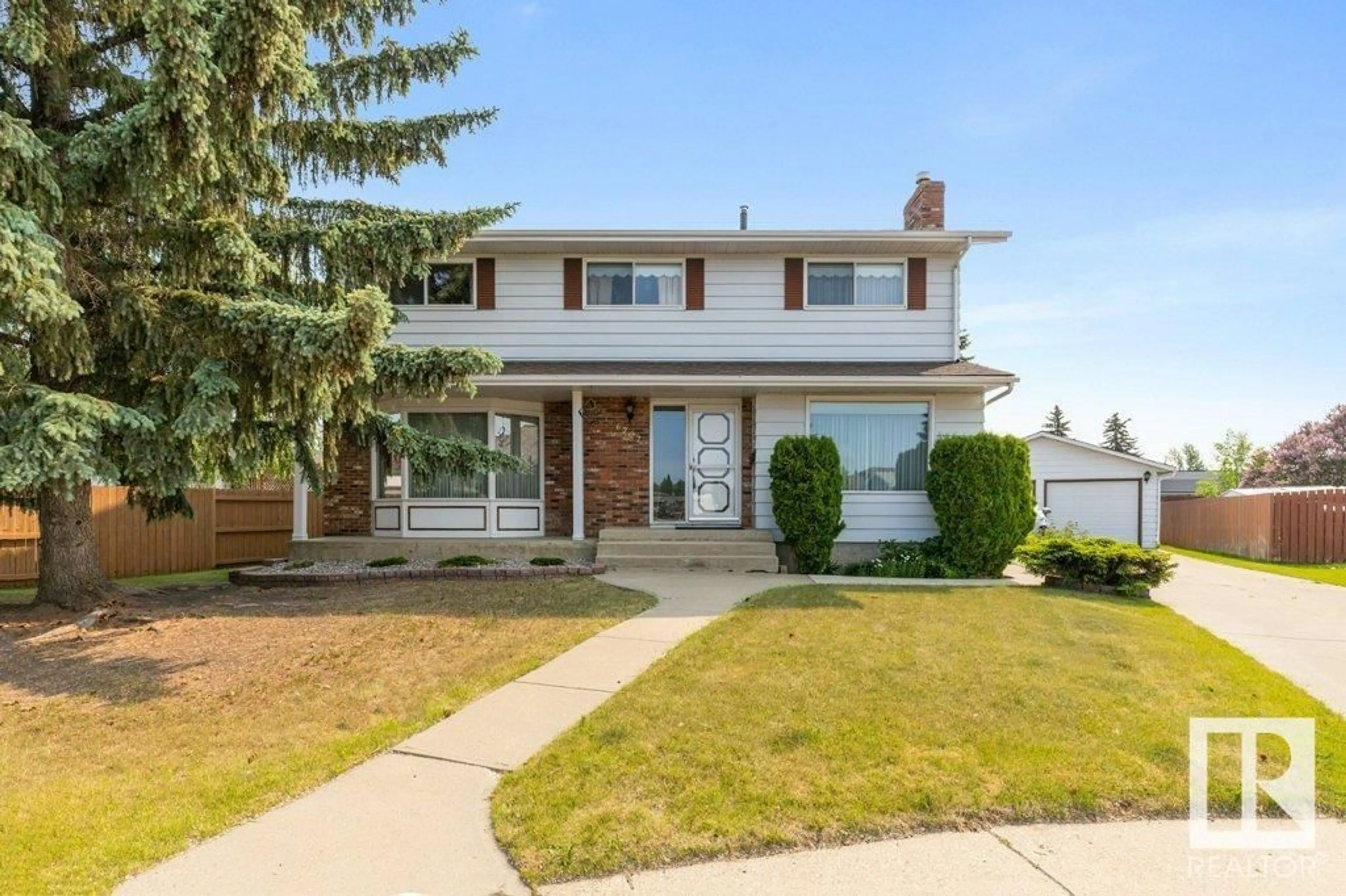 Home with vinyl exterior material, street for 6207 179 ST, Edmonton Alberta T5T3B5