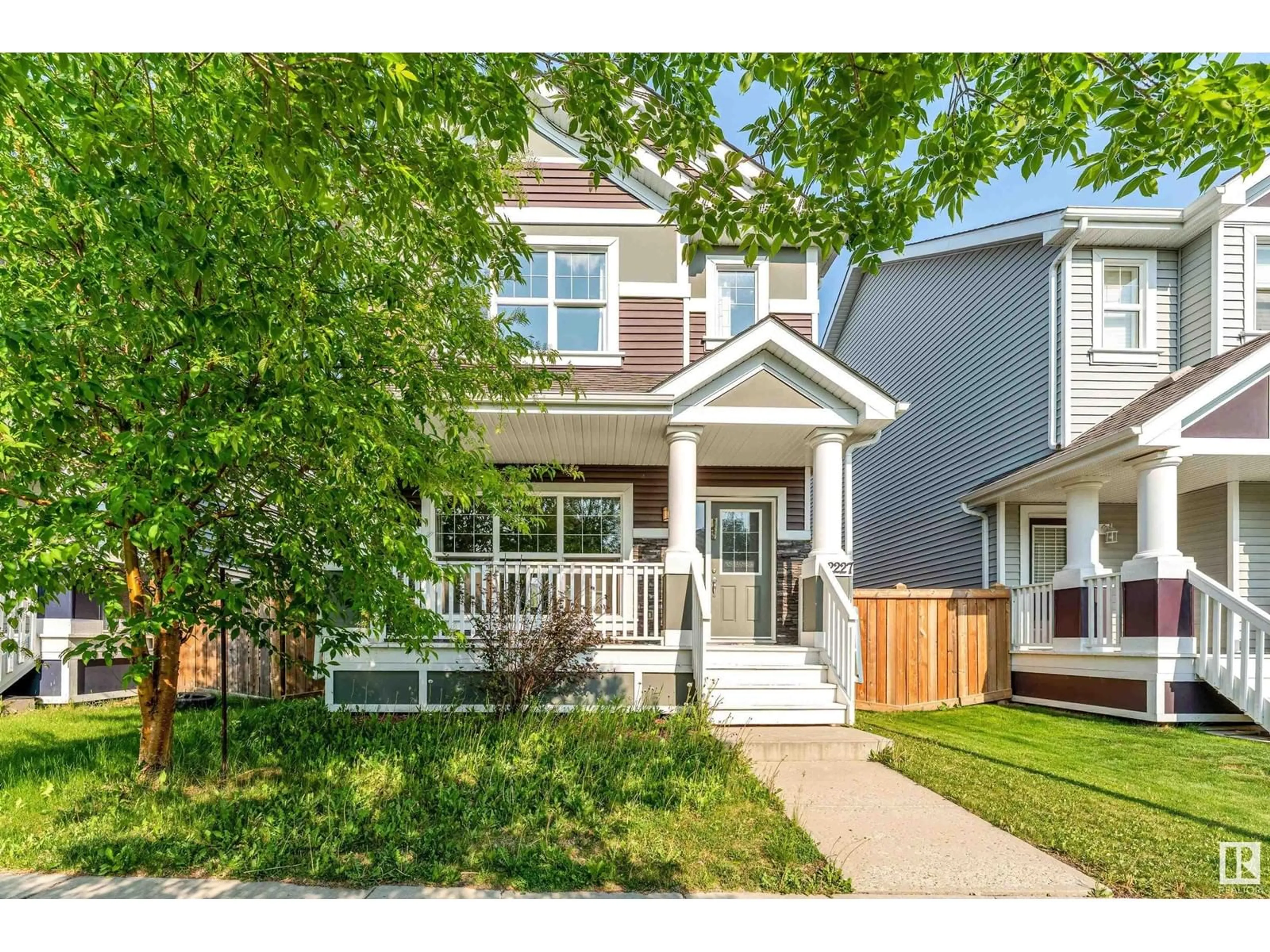 Home with vinyl exterior material, street for 2227 74 ST, Edmonton Alberta T6X0V6