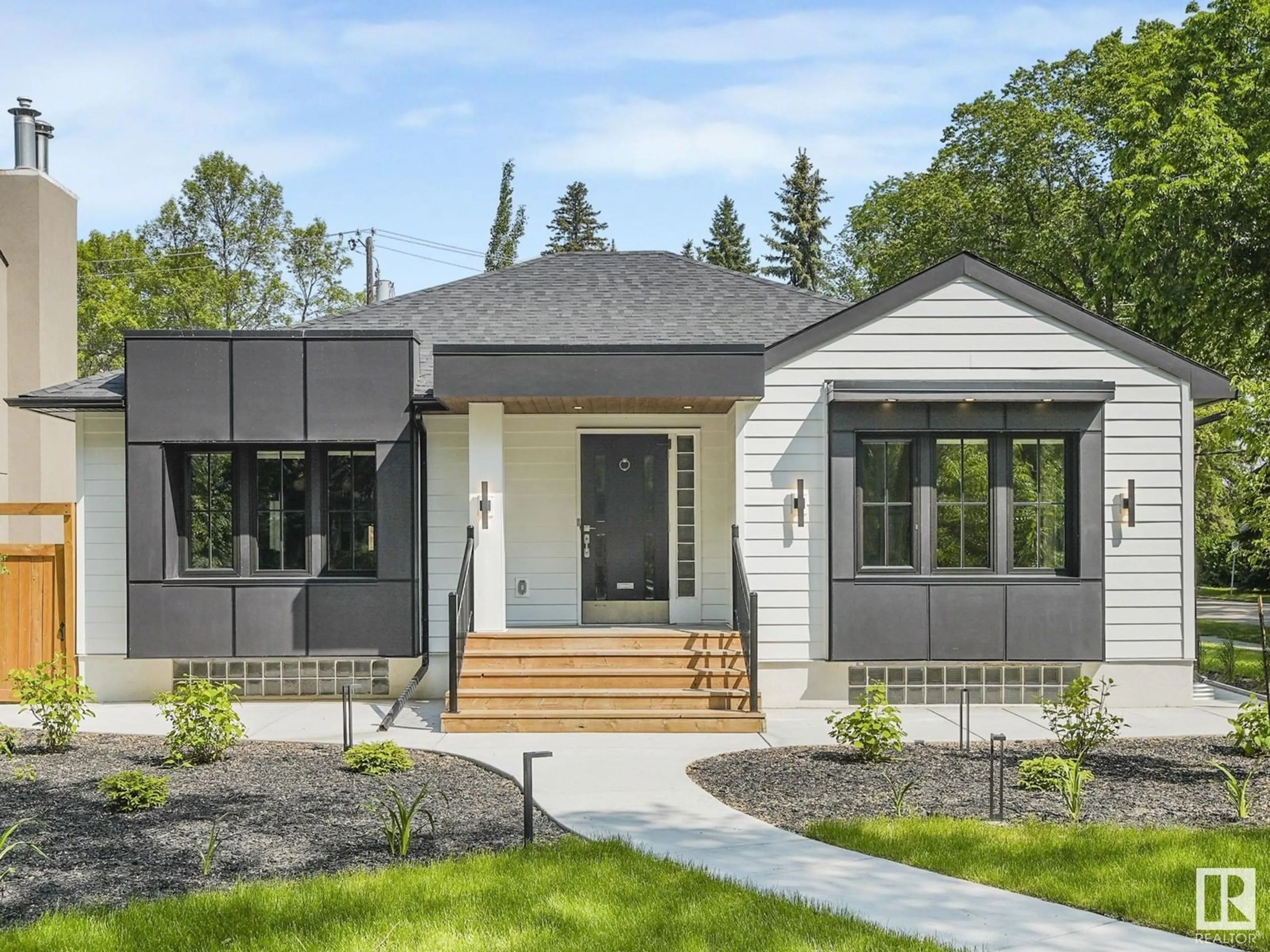 Home with vinyl exterior material, street for 13002 GLENORA CR, Edmonton Alberta T5N0R7