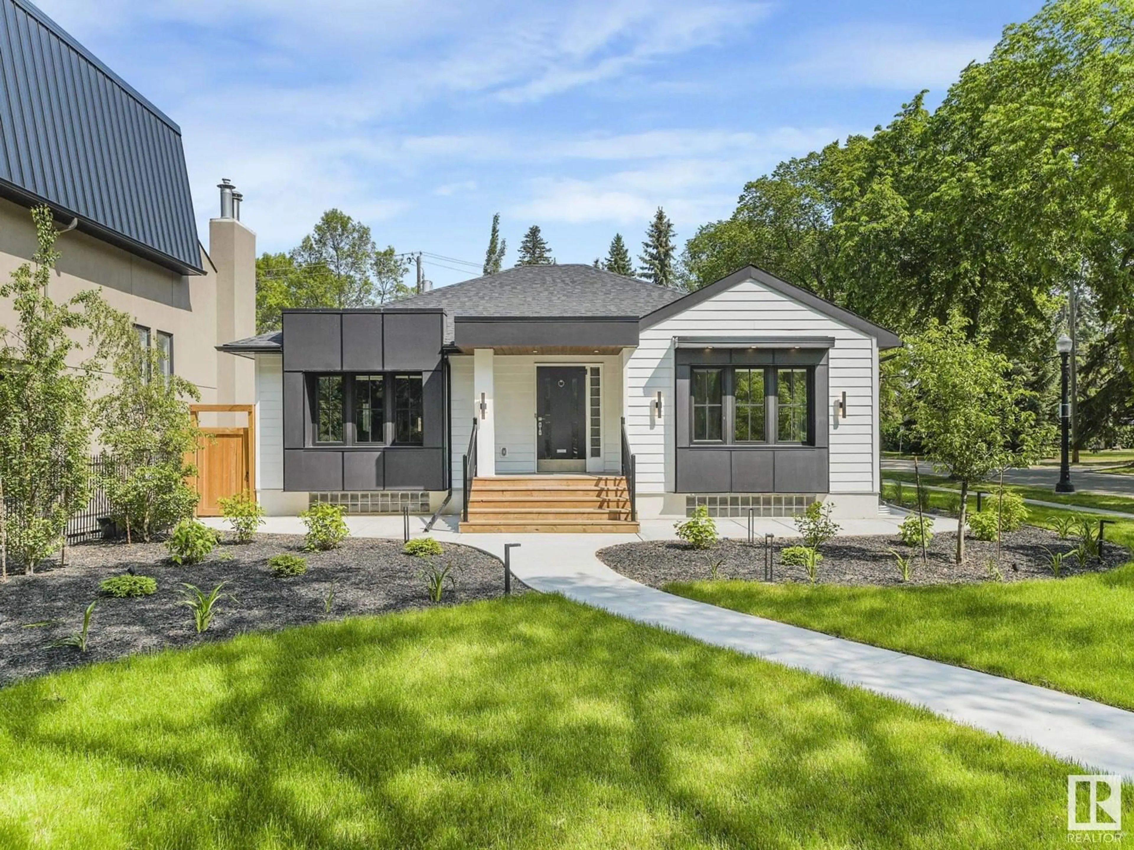 Home with vinyl exterior material, street for 13002 GLENORA CR, Edmonton Alberta T5N0R7