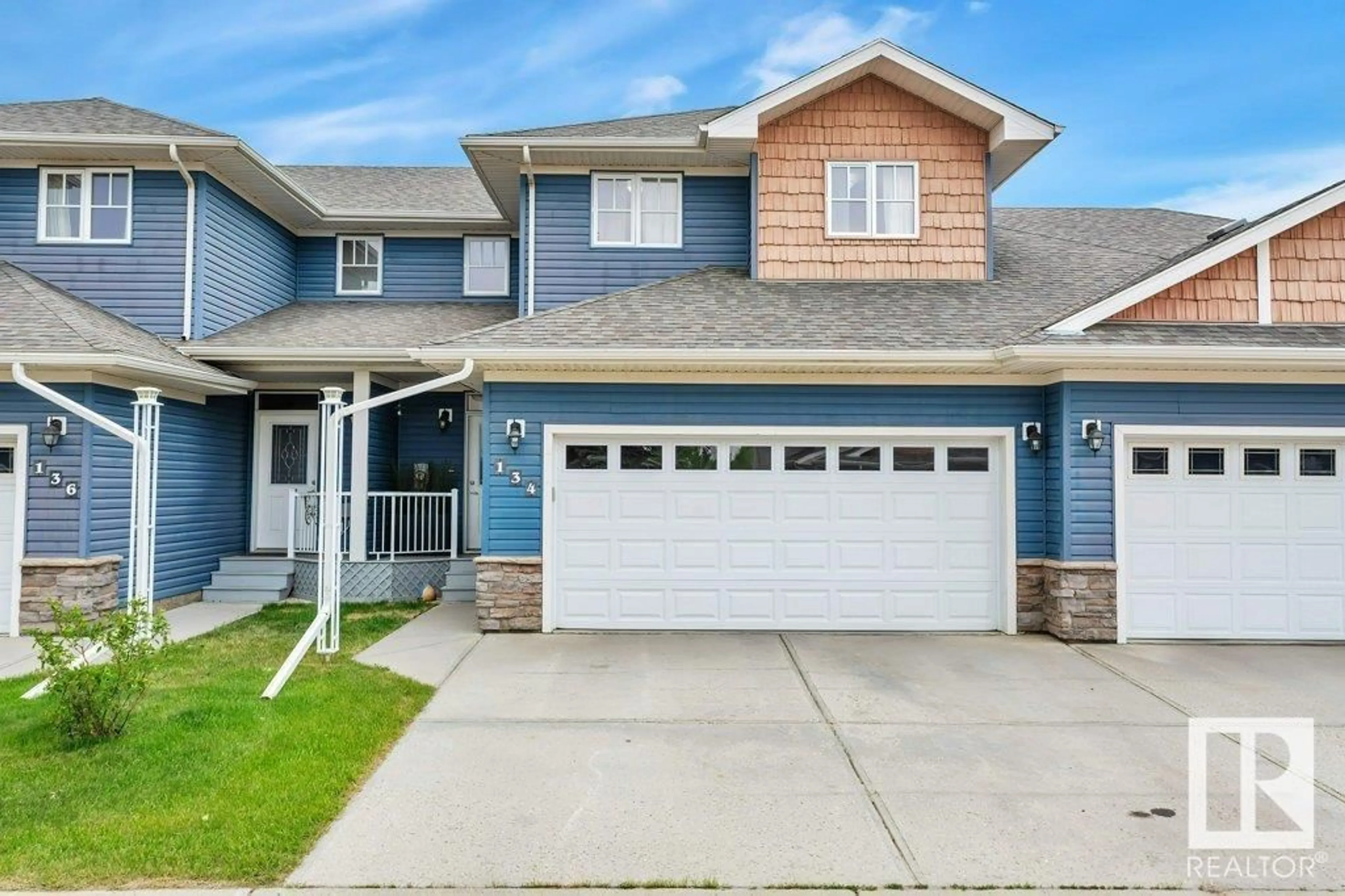 Home with vinyl exterior material, street for 134 102 WEST HAVEN DR, Leduc Alberta T9E0A2