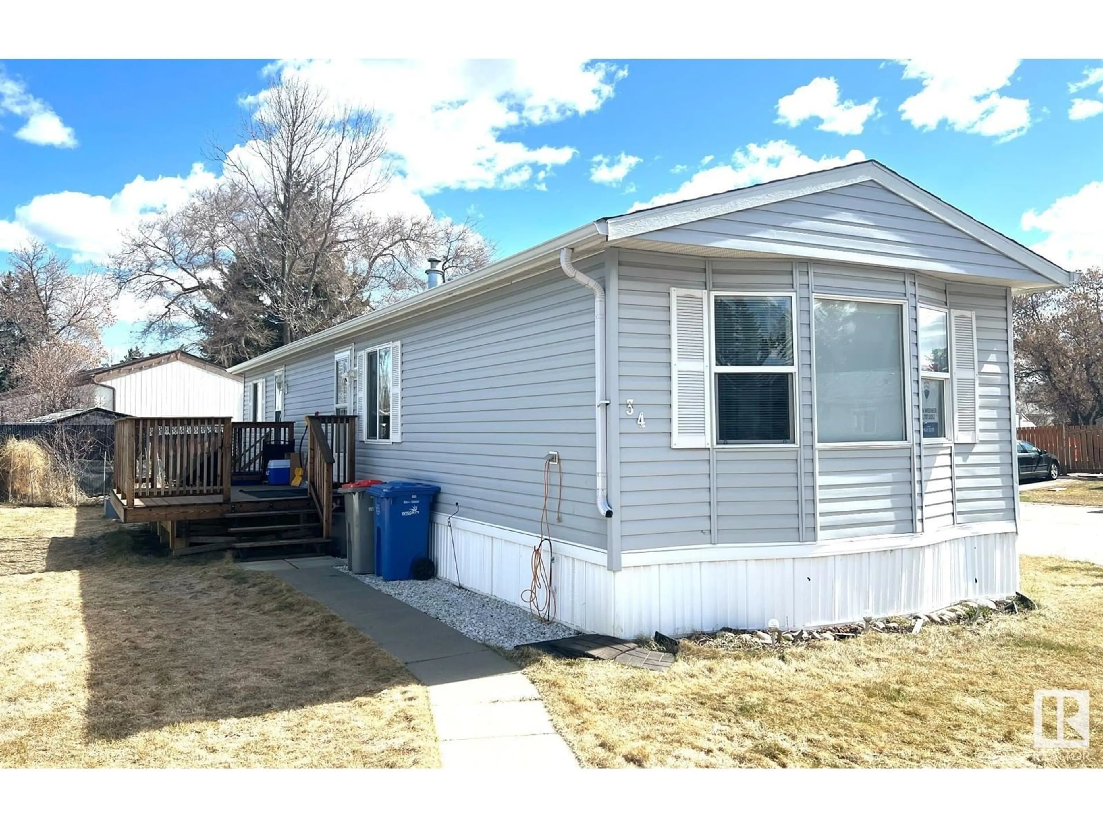 Home with vinyl exterior material, street for 34 WILLOW PARK ESTATES, Leduc Alberta T9E5R1