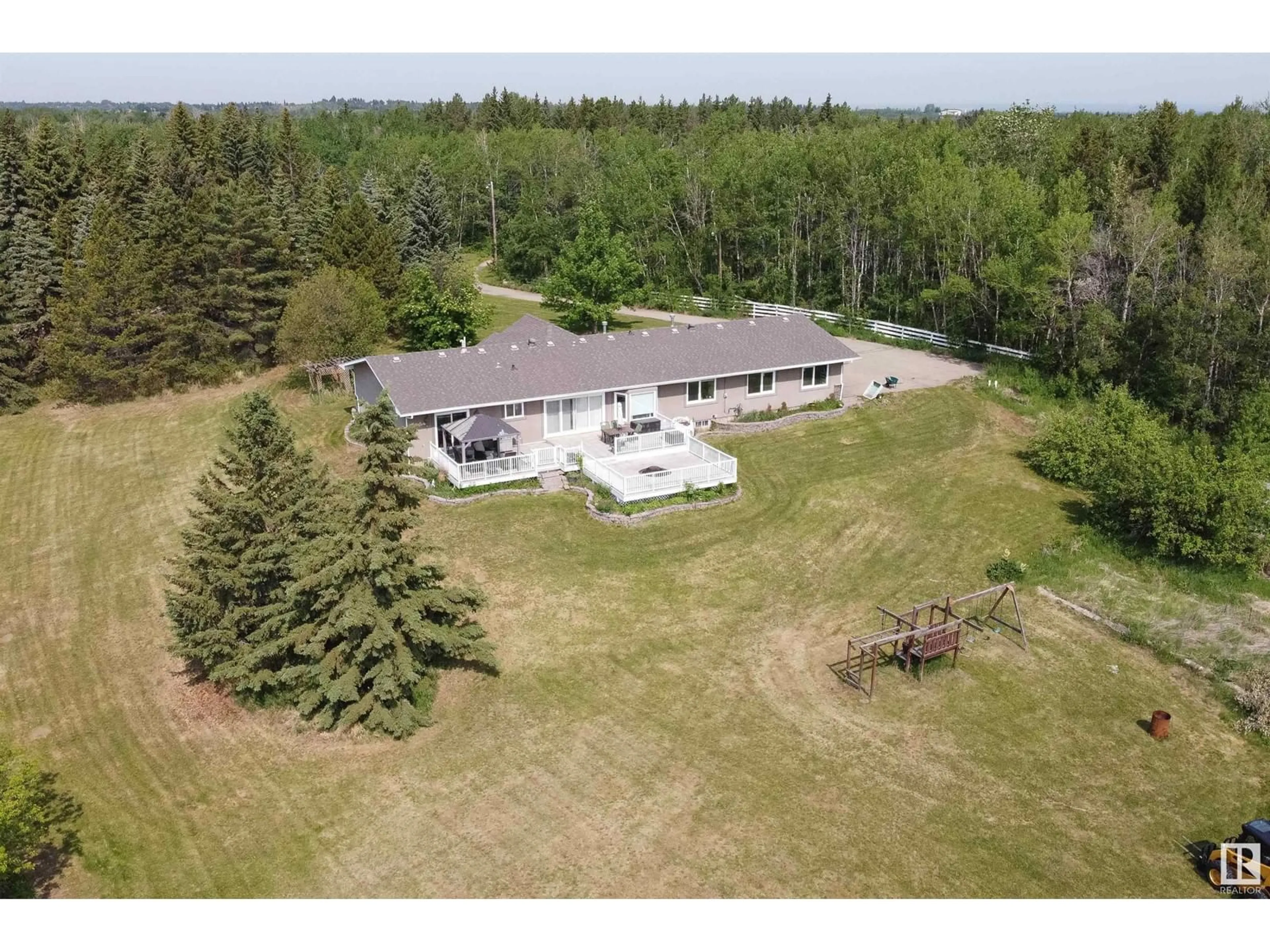 A pic from outside/outdoor area/front of a property/back of a property/a pic from drone, building for 52479 RGE ROAD 225, Rural Strathcona County Alberta T8A4R9