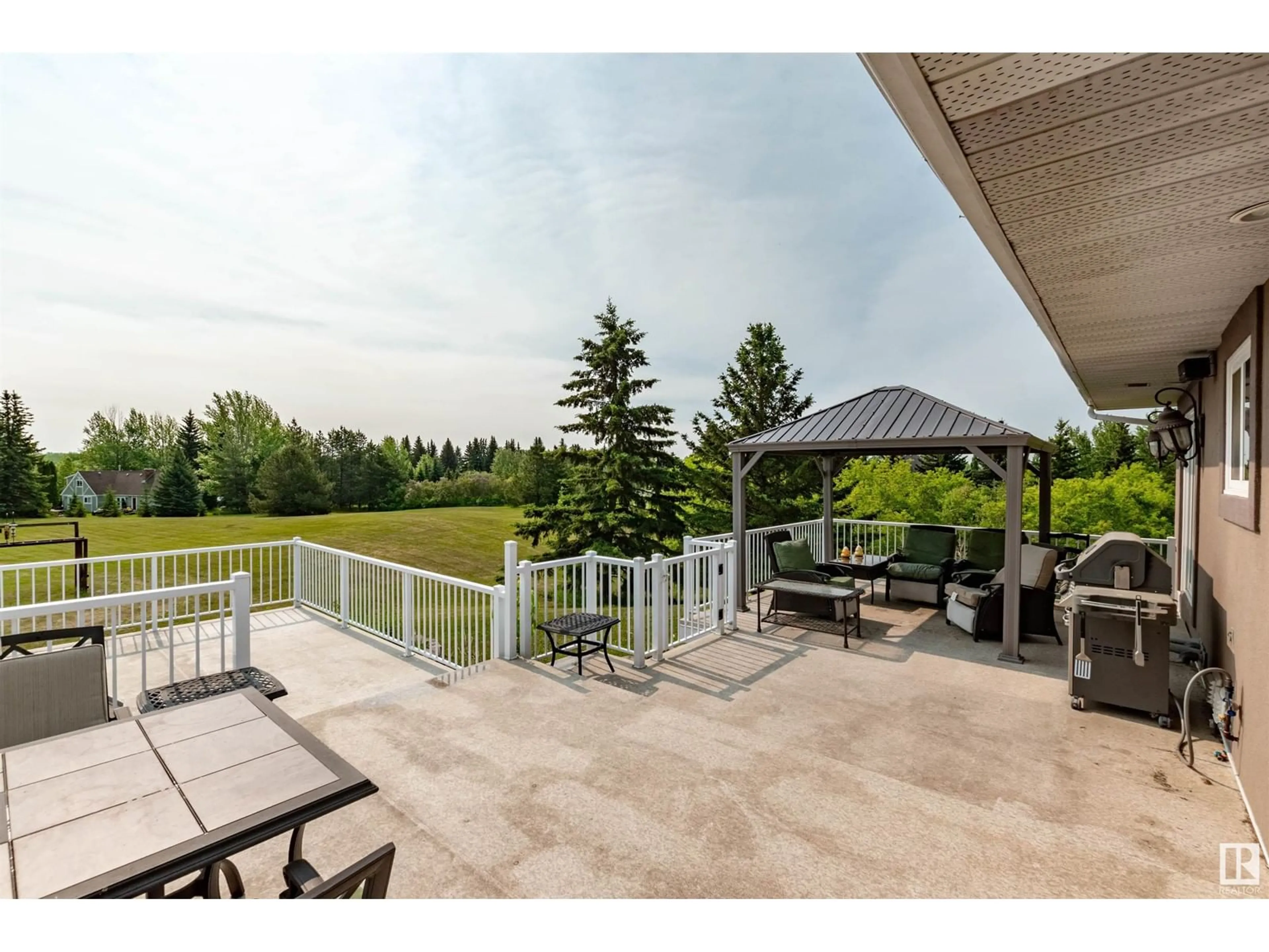 Patio, water/lake/river/ocean view for 52479 RGE ROAD 225, Rural Strathcona County Alberta T8A4R9