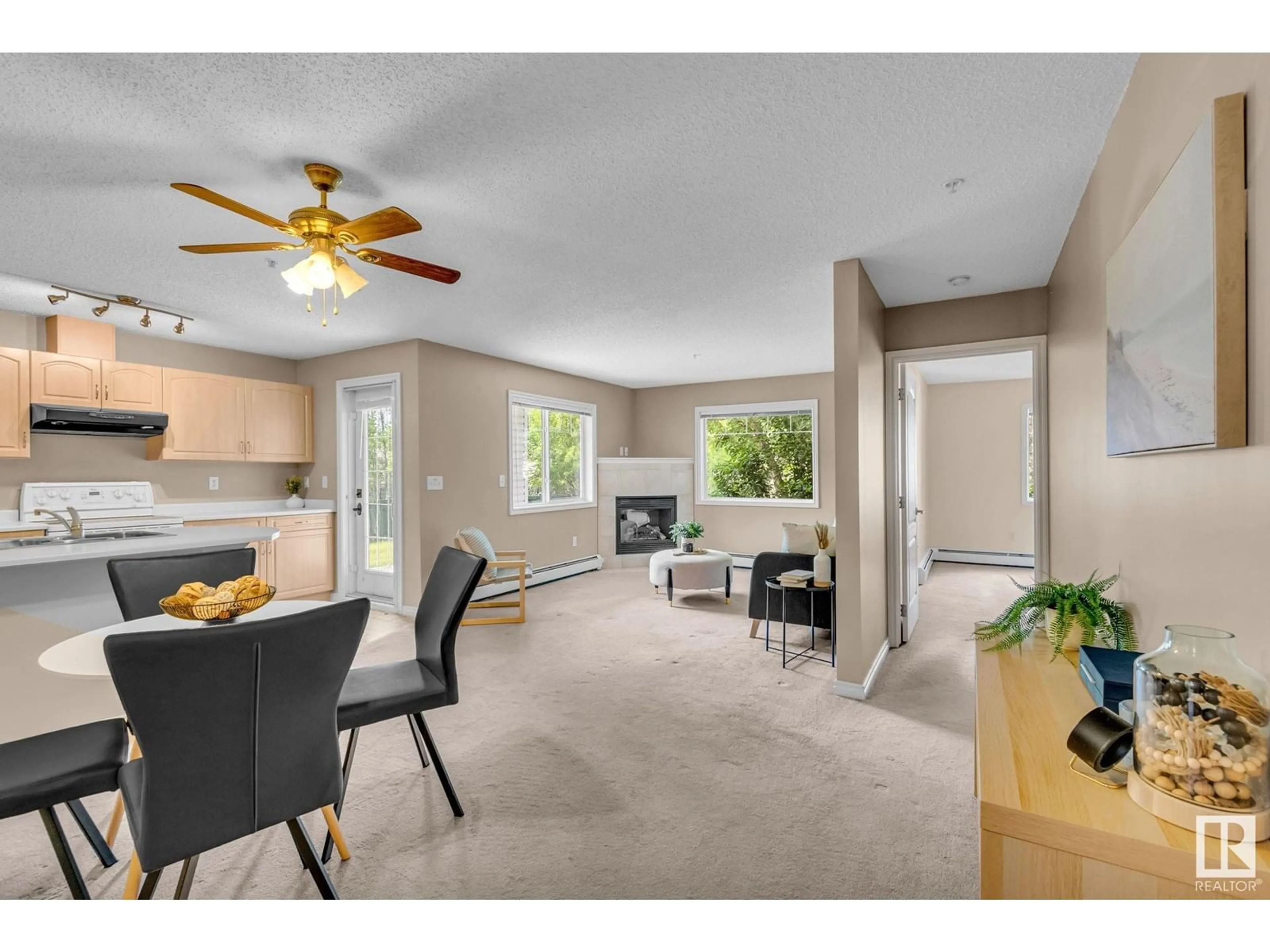 Living room with furniture, unknown for #114 - 905 BLACKLOCK WY, Edmonton Alberta T6W1M7
