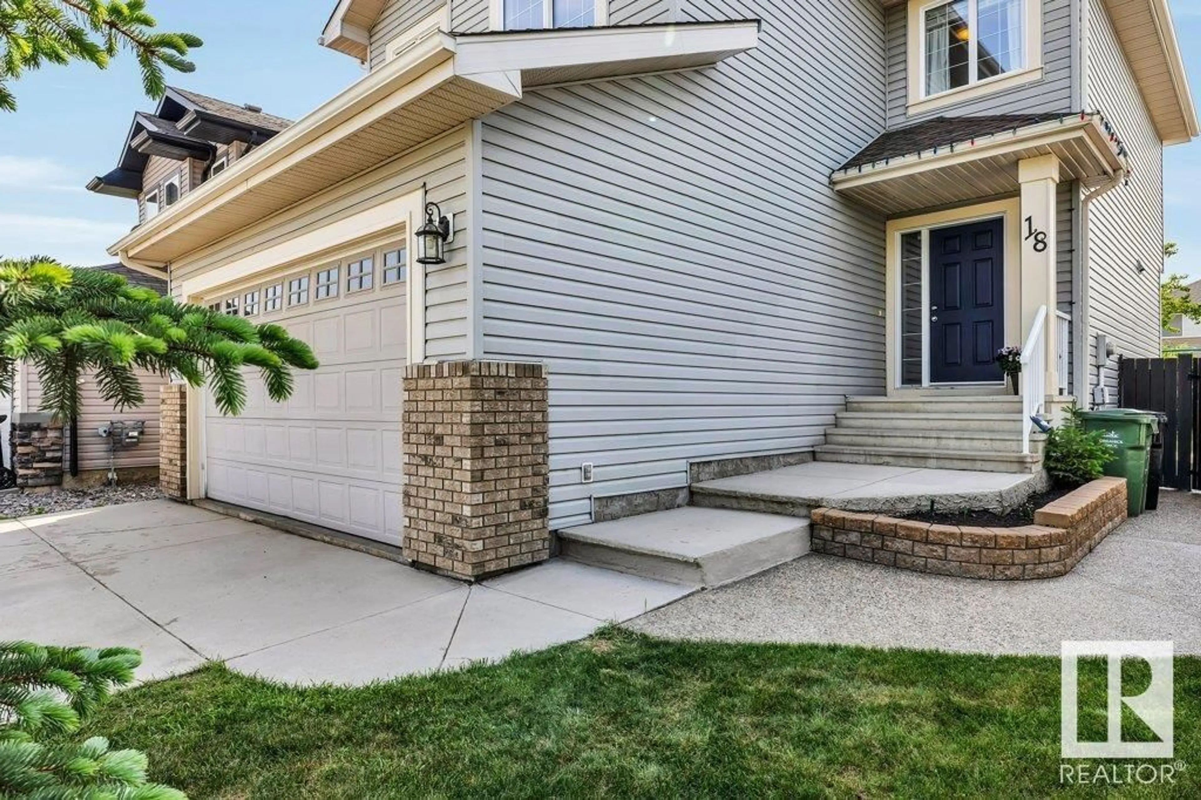 Home with vinyl exterior material, street for 18 SNOWDROP CO, Leduc Alberta T9E0H5