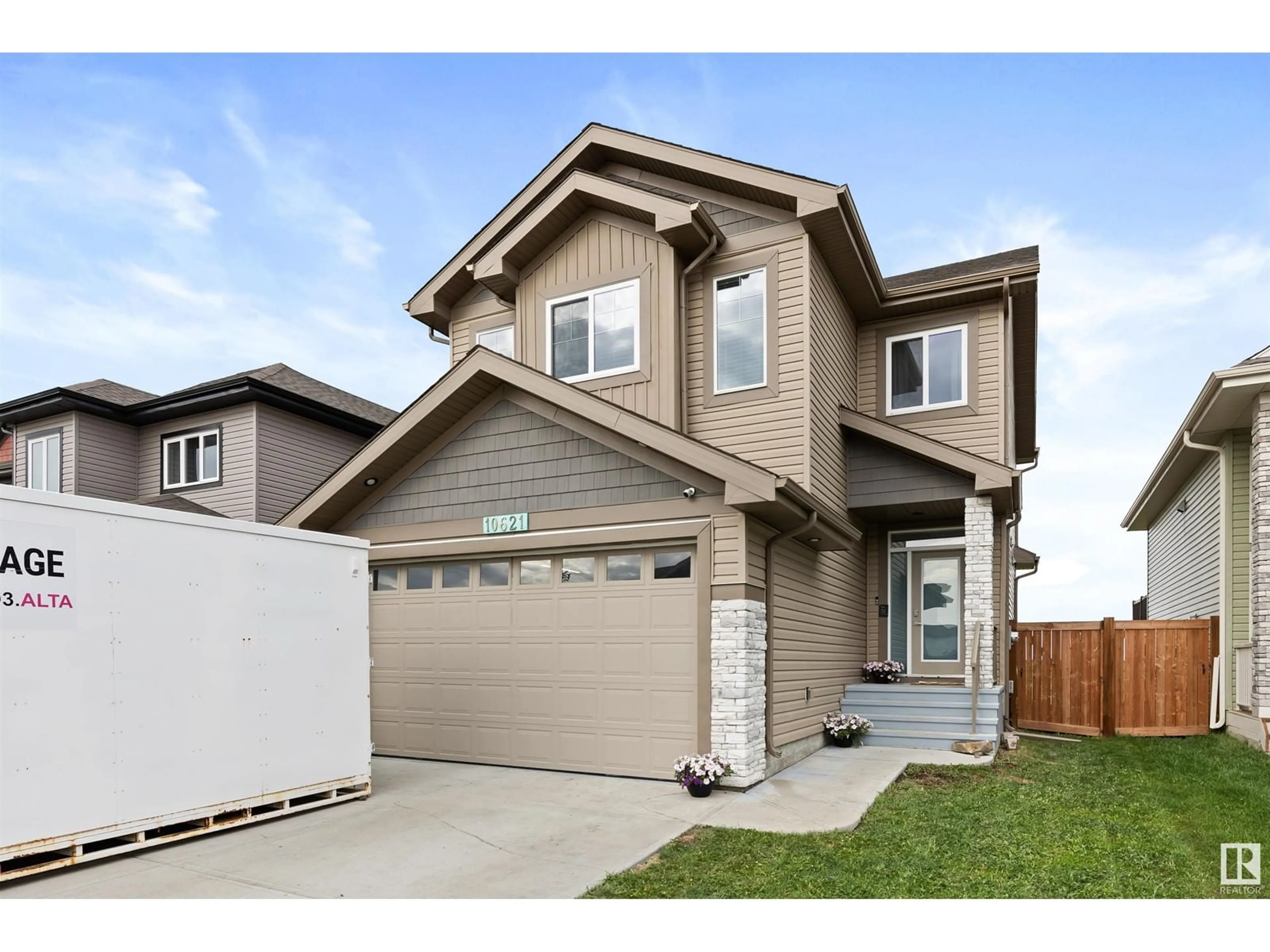 Home with vinyl exterior material, street for 10621 96 ST, Morinville Alberta T8R2N5