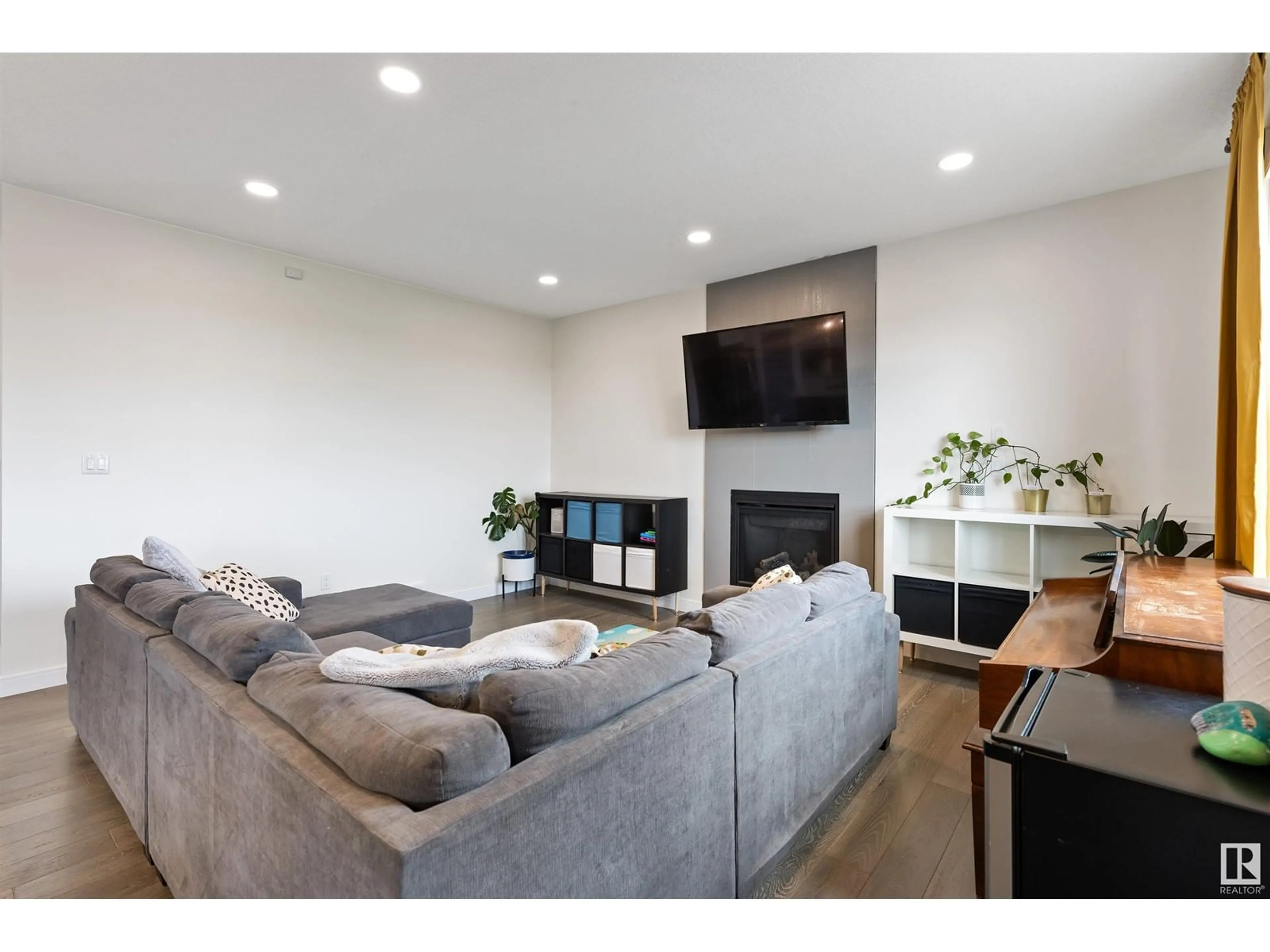 Living room with furniture, unknown for 10621 96 ST, Morinville Alberta T8R2N5