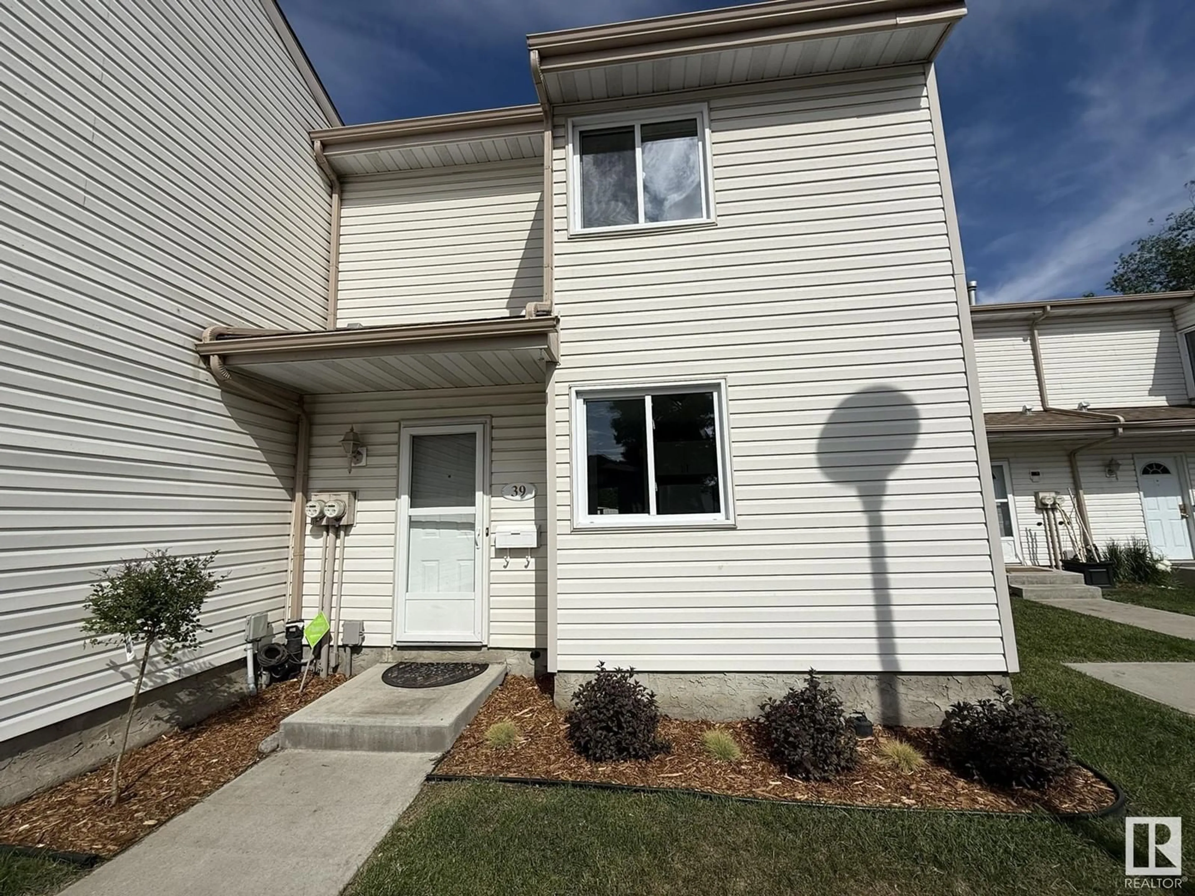 Home with vinyl exterior material, street for #39 - 2024 57 ST, Edmonton Alberta T6L2Z3