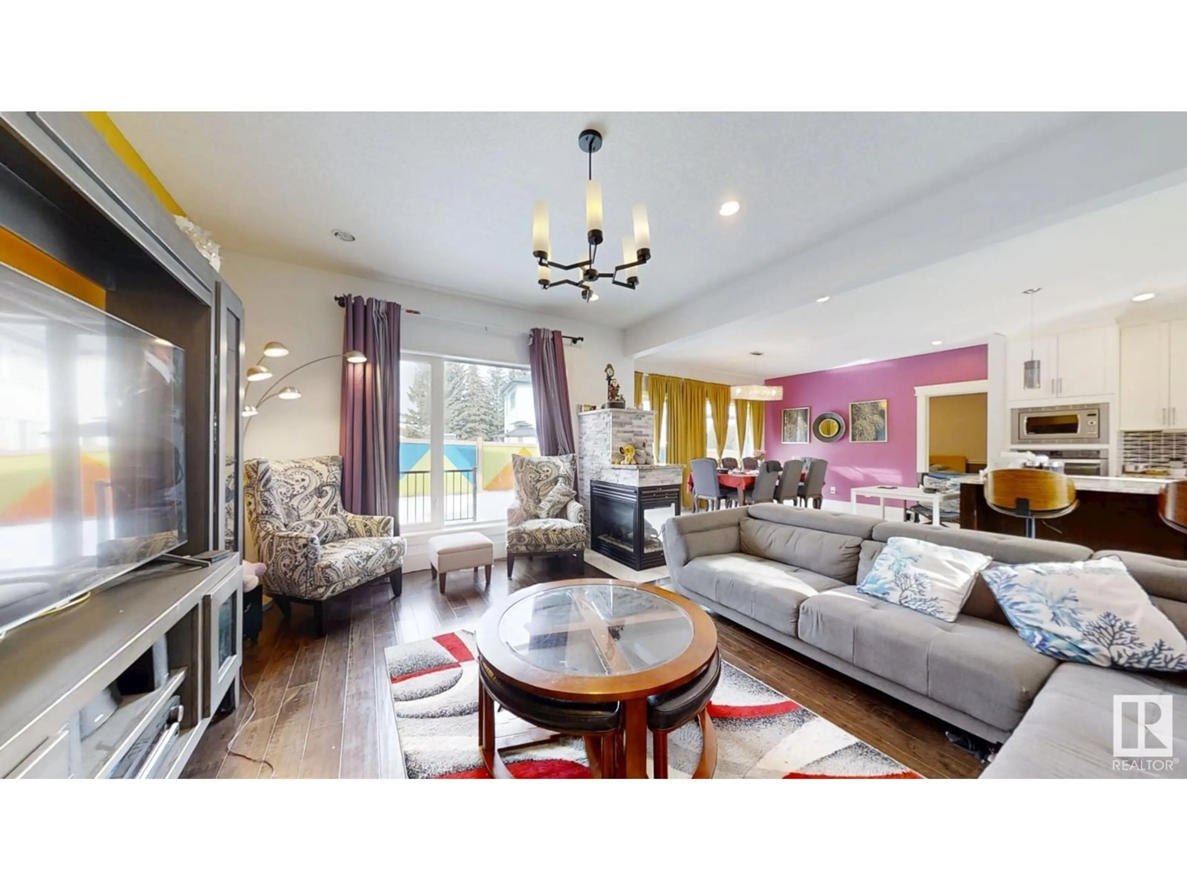 Living room with furniture, wood/laminate floor for 1273 ADAMSON DR, Edmonton Alberta T6W2N7