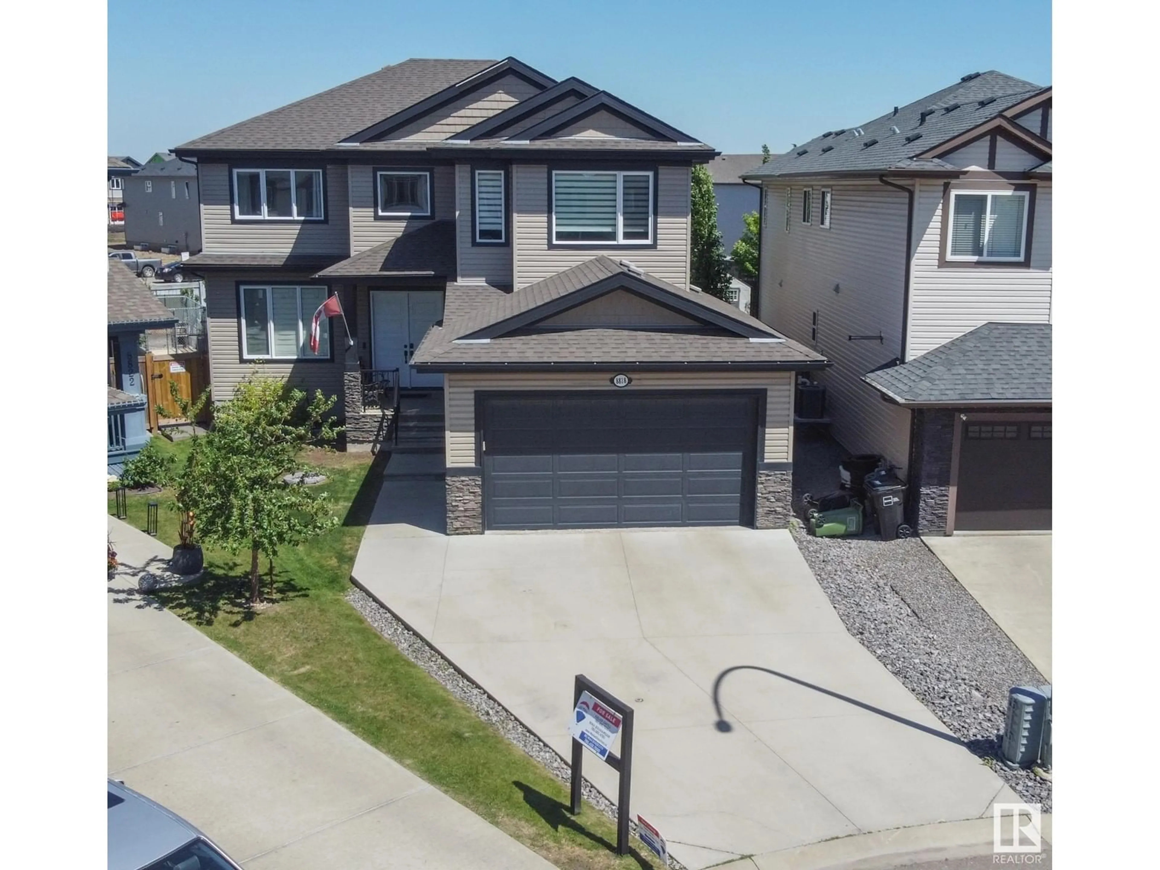 A pic from outside/outdoor area/front of a property/back of a property/a pic from drone, street for 8818 180A AV, Edmonton Alberta T5Z0J4